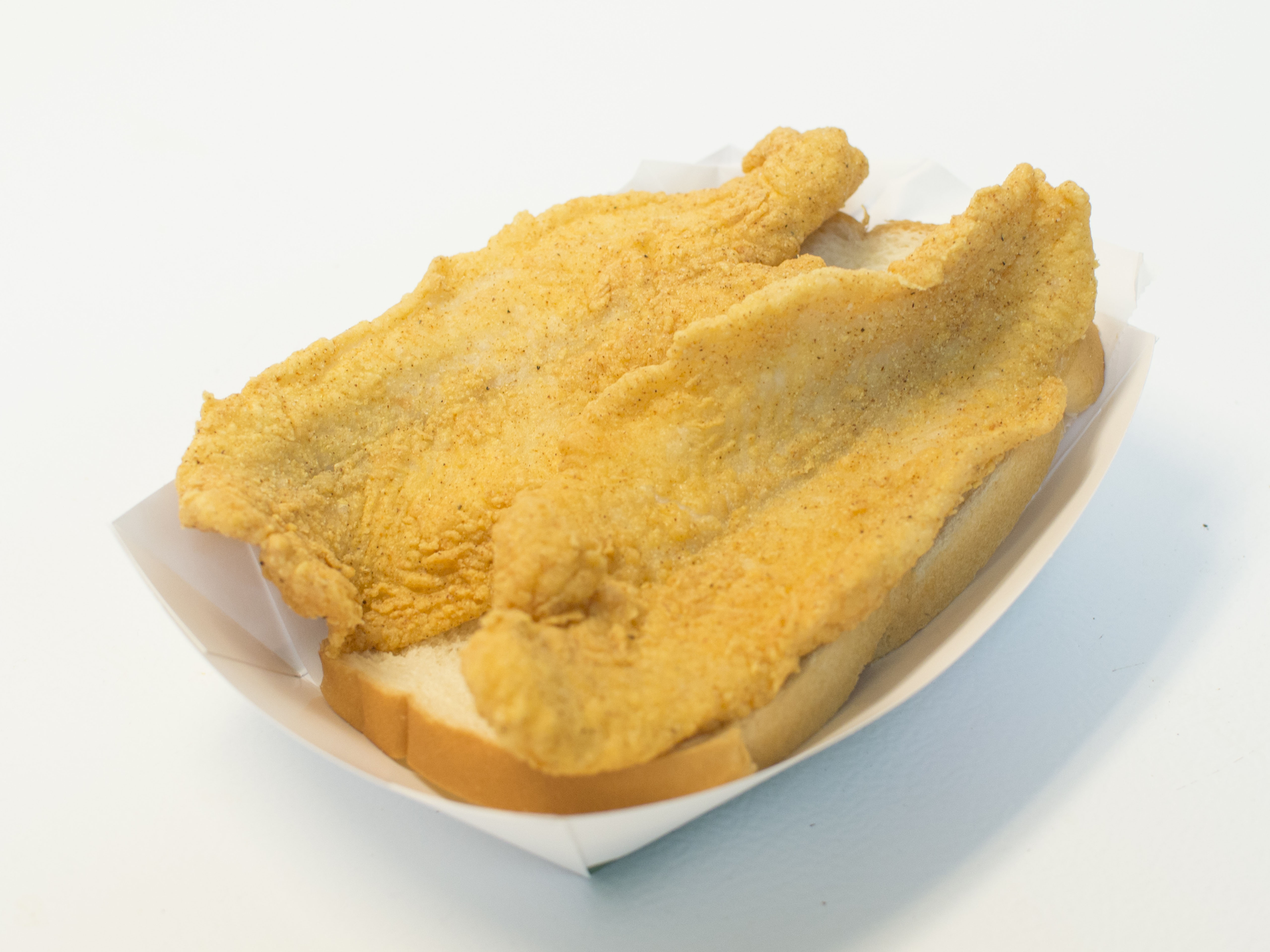 Order 4 Piece Catfish food online from Harold's Chicken Shack store, Chicago on bringmethat.com