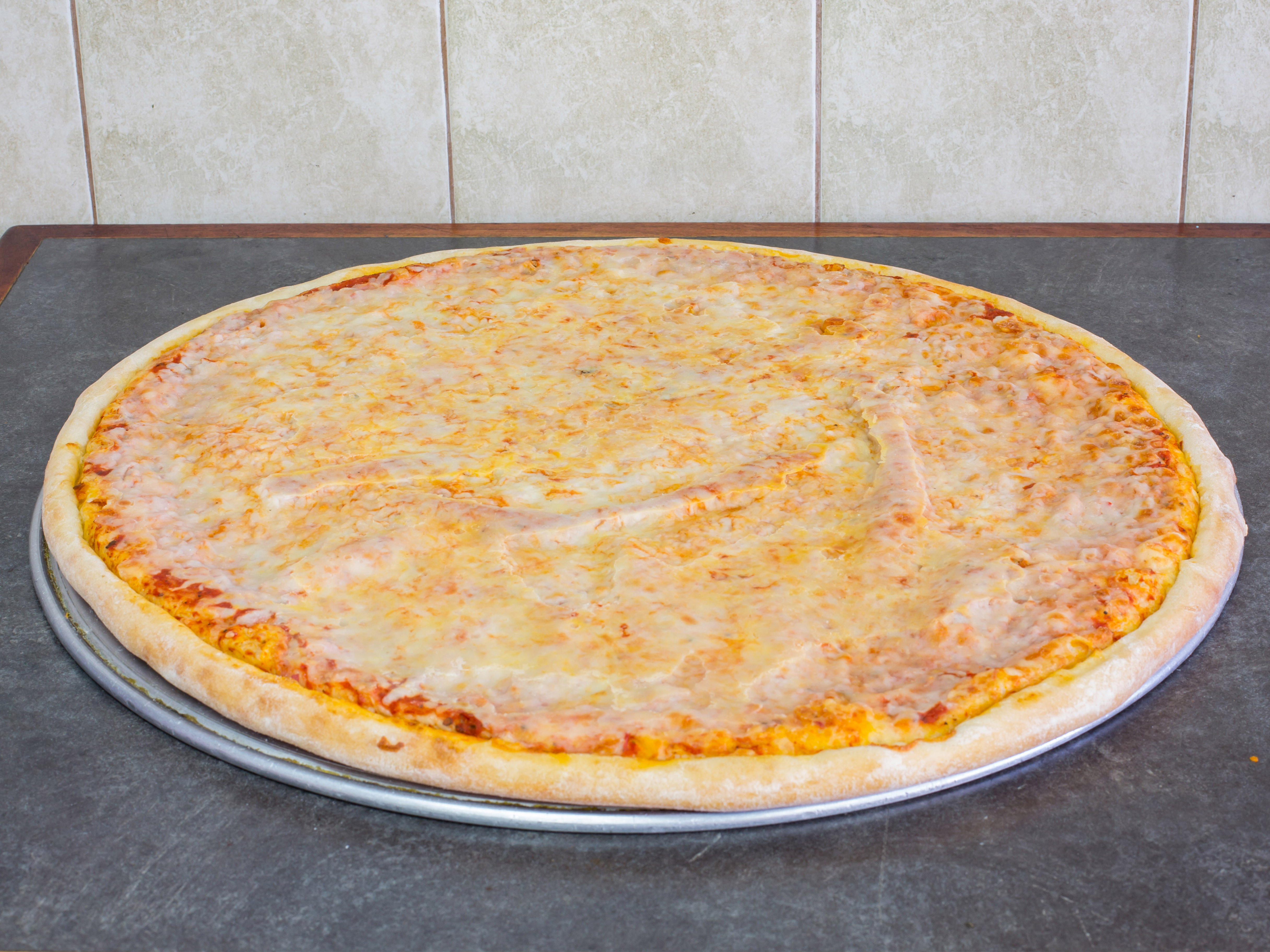 Order 18" Large Pie food online from Kennedy Pizza & Fried Chicken store, Newark on bringmethat.com