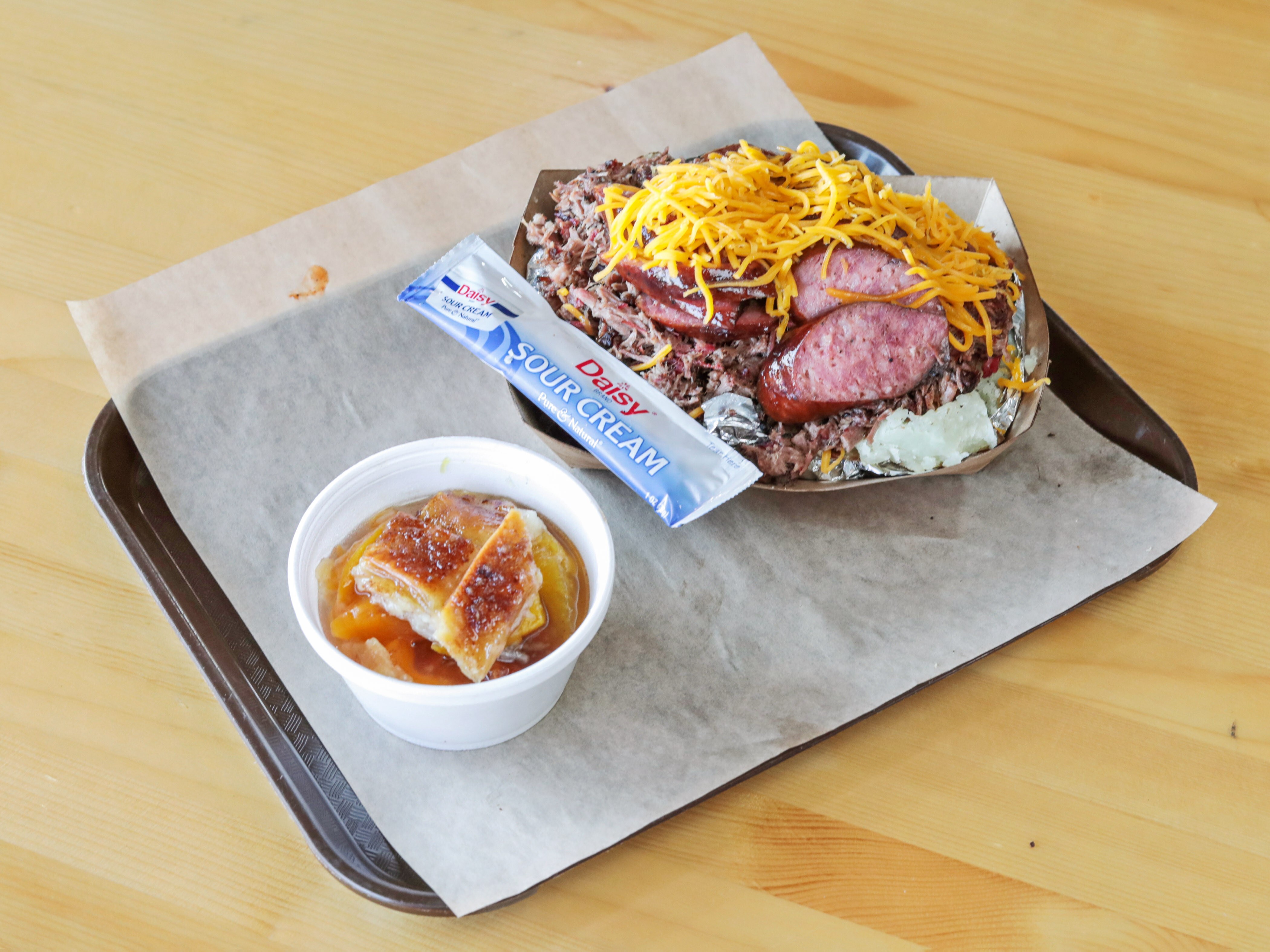 Order Loaded Potato with 1 Meat food online from Berry Best Bbq store, North Richland Hills on bringmethat.com