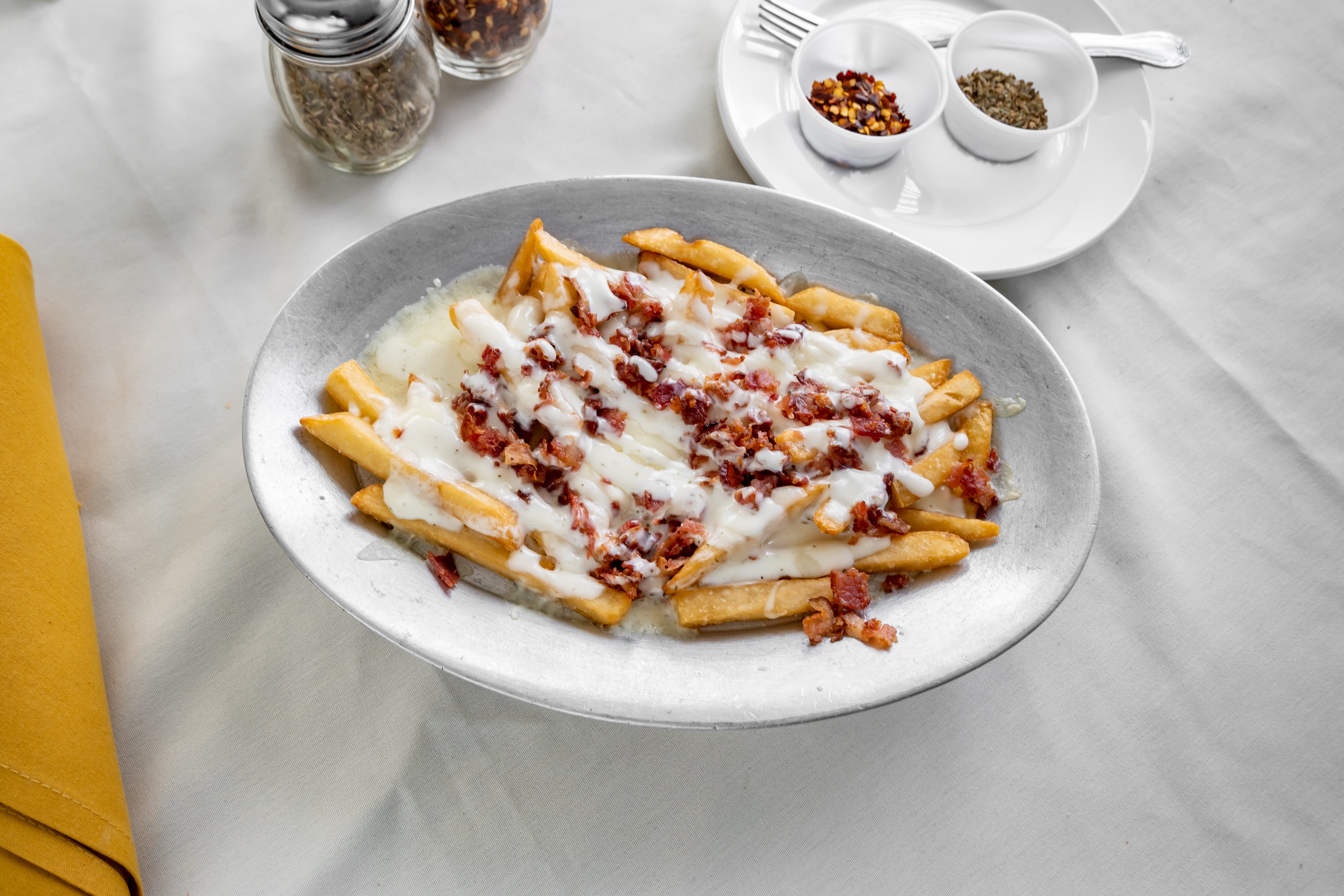 Order Loaded Fries - Side food online from Mama's Pizza Grille & Bistro store, Mt Laurel on bringmethat.com
