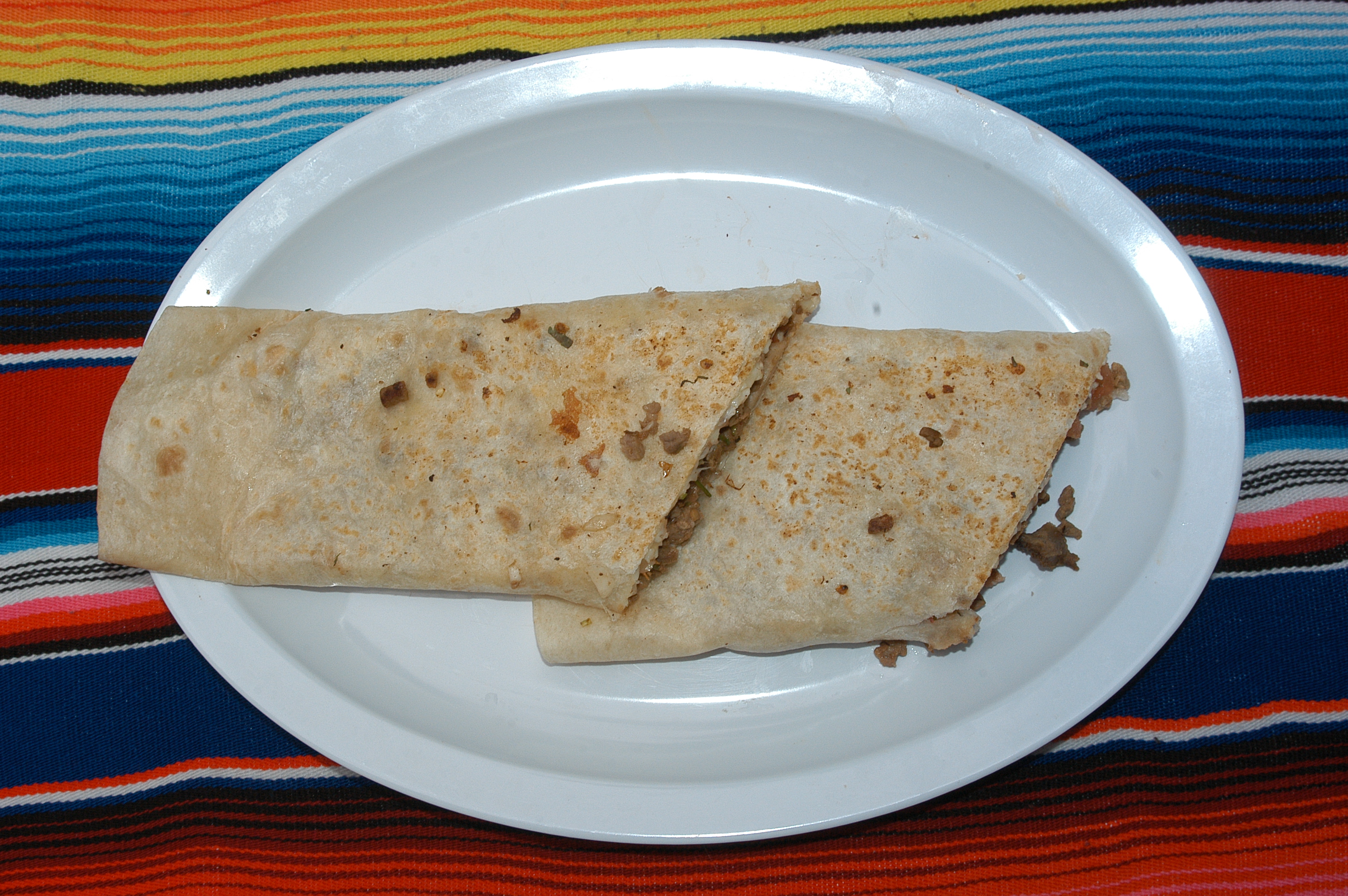 Order Quesadilla Suiza with Meat food online from Taqueria Los Gallos Express store, Pleasant Hill on bringmethat.com