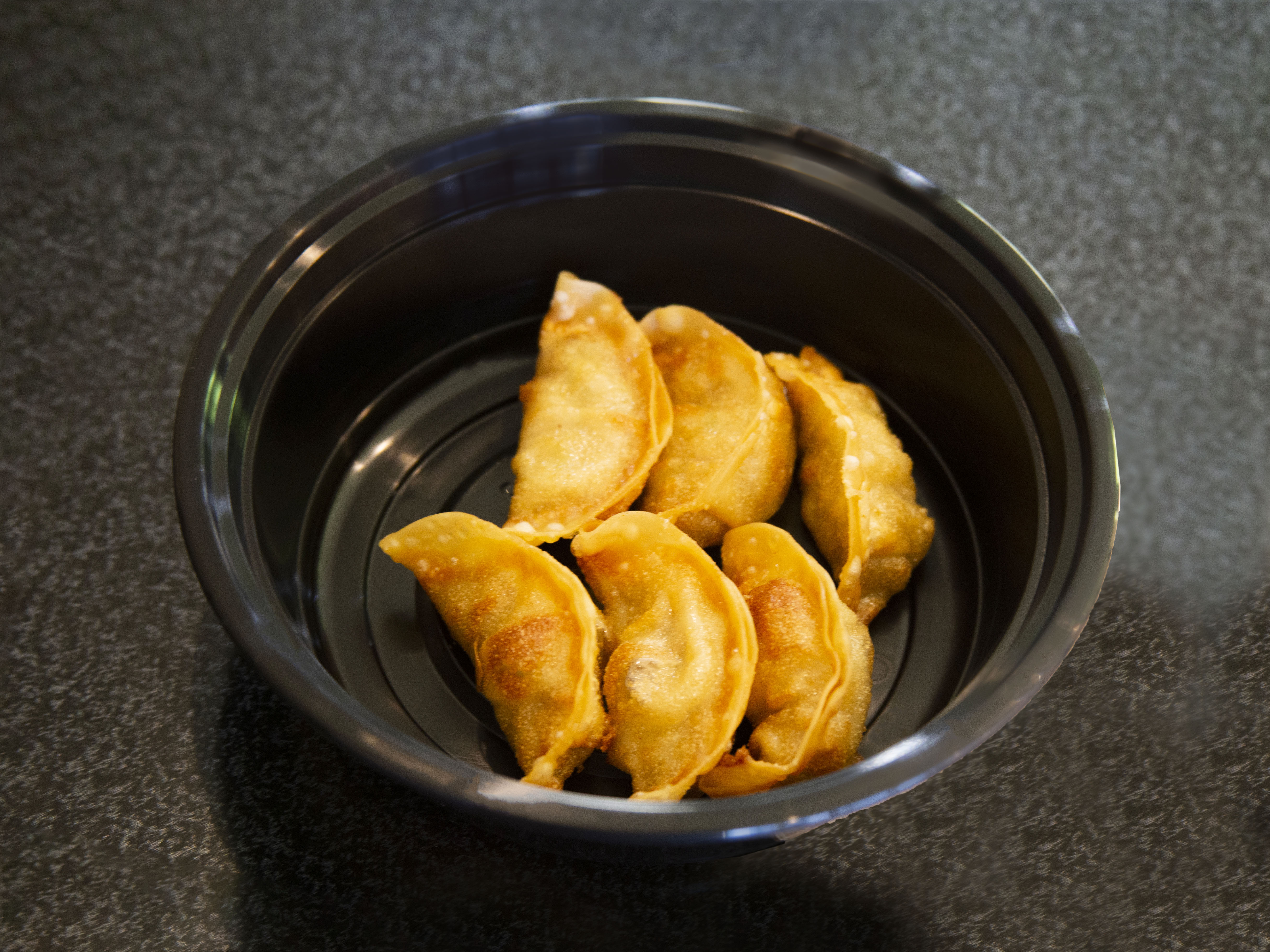 Order 6 Pieces Pork Dumplings food online from What The Fried Rice store, Northwood on bringmethat.com