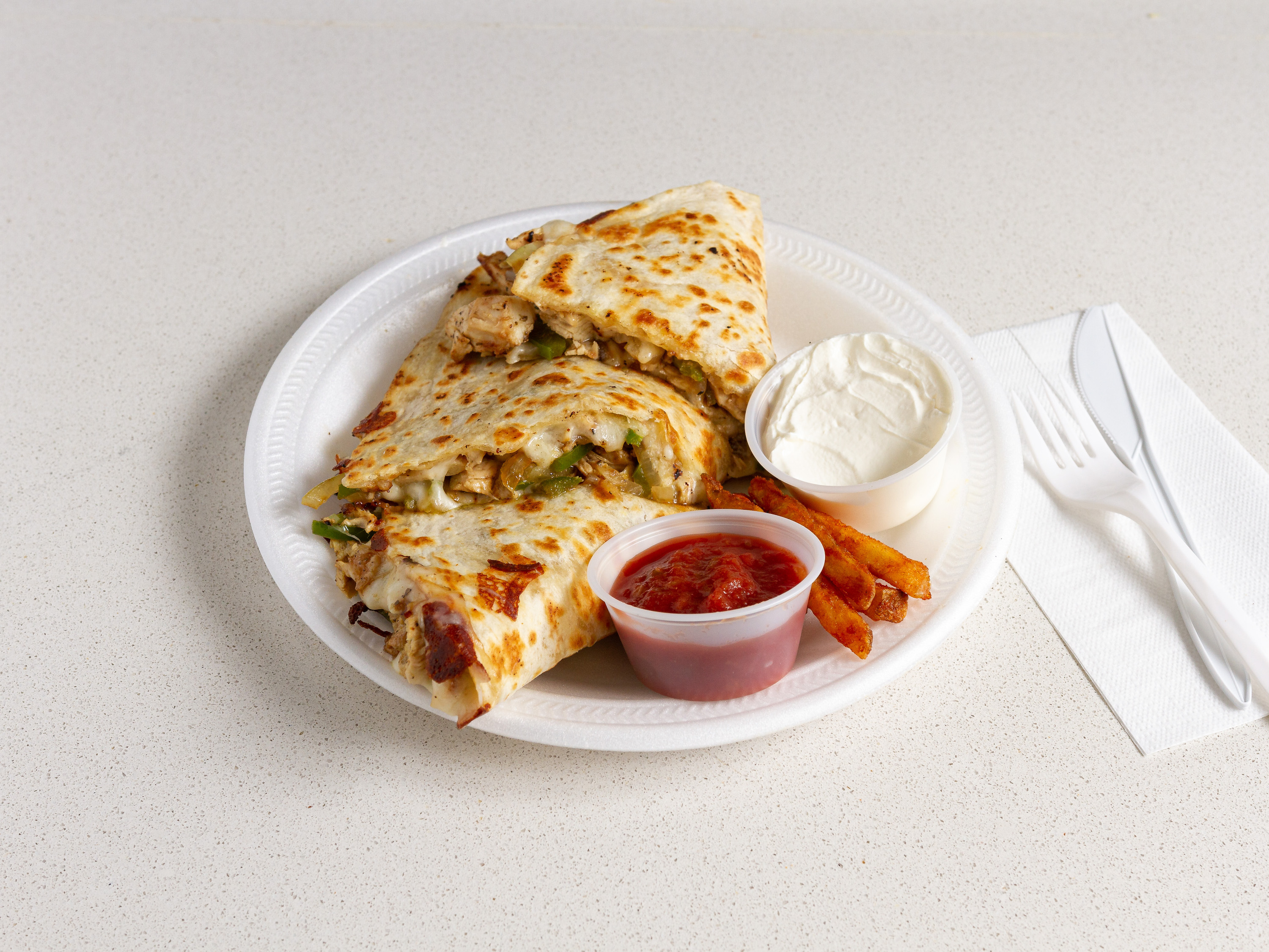 Order Grilled chicken Quesadilla food online from Natural Choice Deli store, Baltimore on bringmethat.com