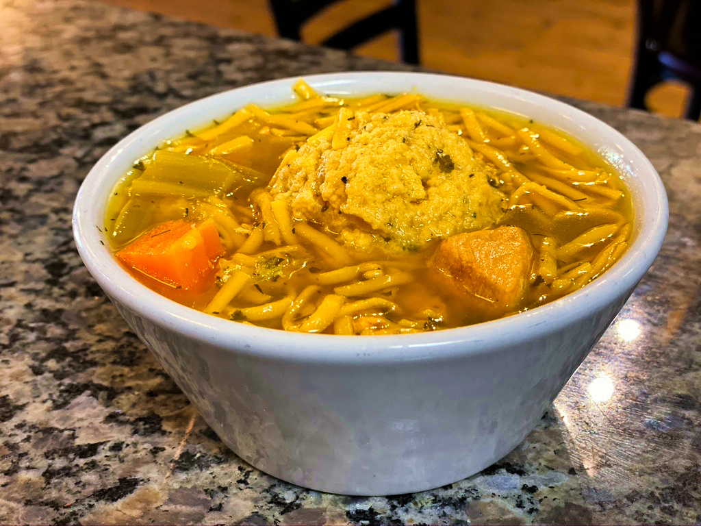 Order Matzoh Ball Soup food online from CELEBRITY DELLY store, Falls Church on bringmethat.com