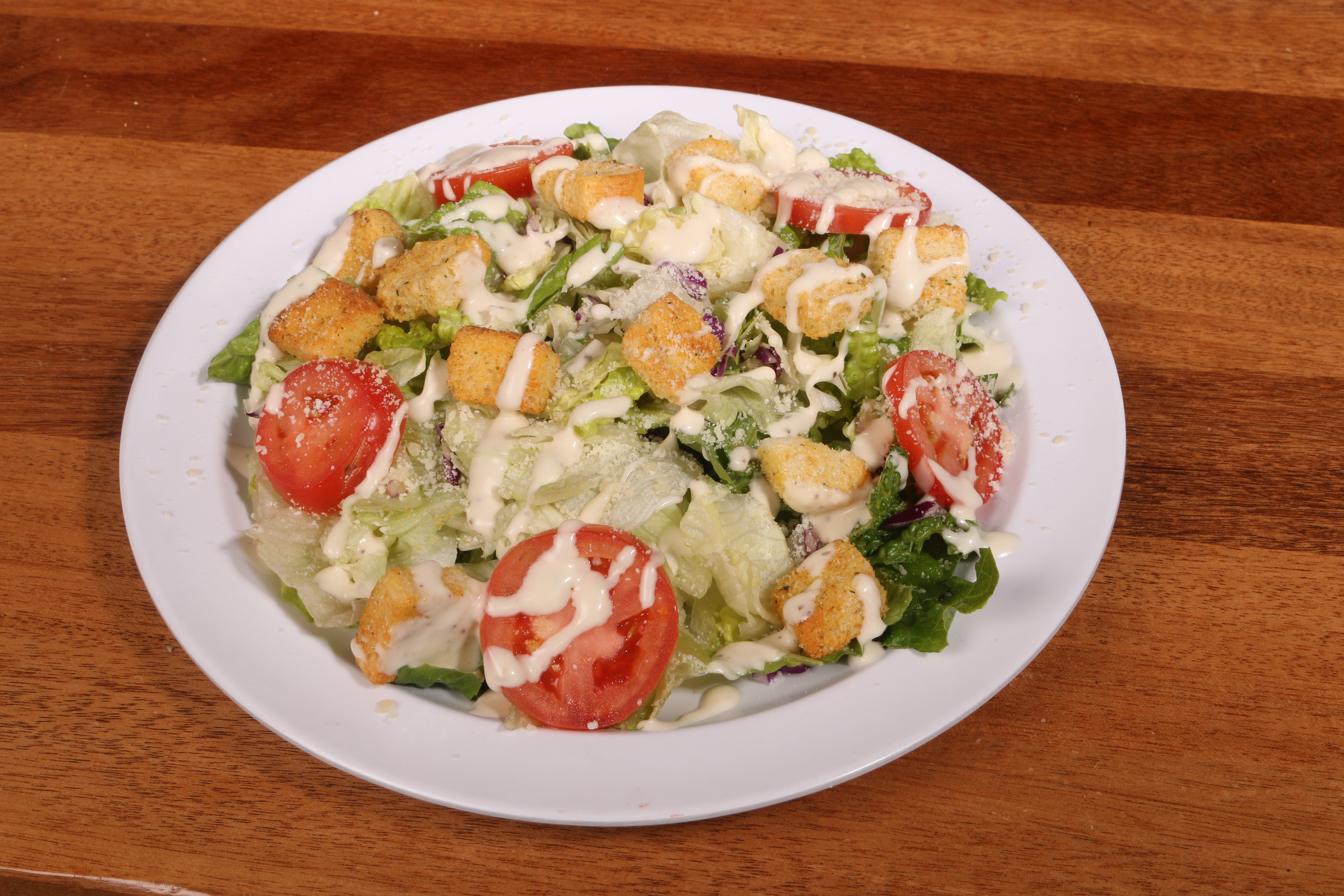 Order Caesar Salad food online from UnCommon Pizza store, Lititz on bringmethat.com