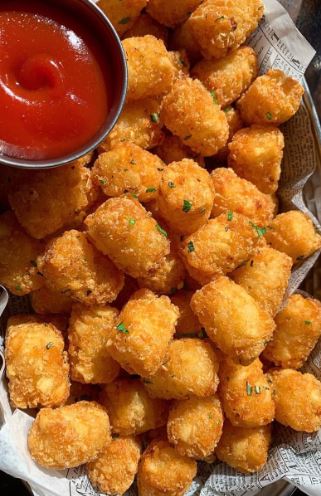Order Tater Tots Basket food online from Downers Sand Club Sports Bar & Grill store, Downers Grove on bringmethat.com