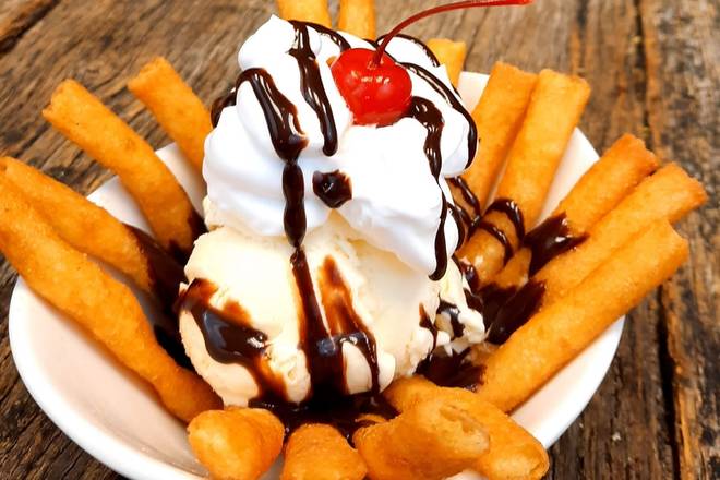 Order Funnel Fries food online from Native Grill & Wings store, San Antonio on bringmethat.com