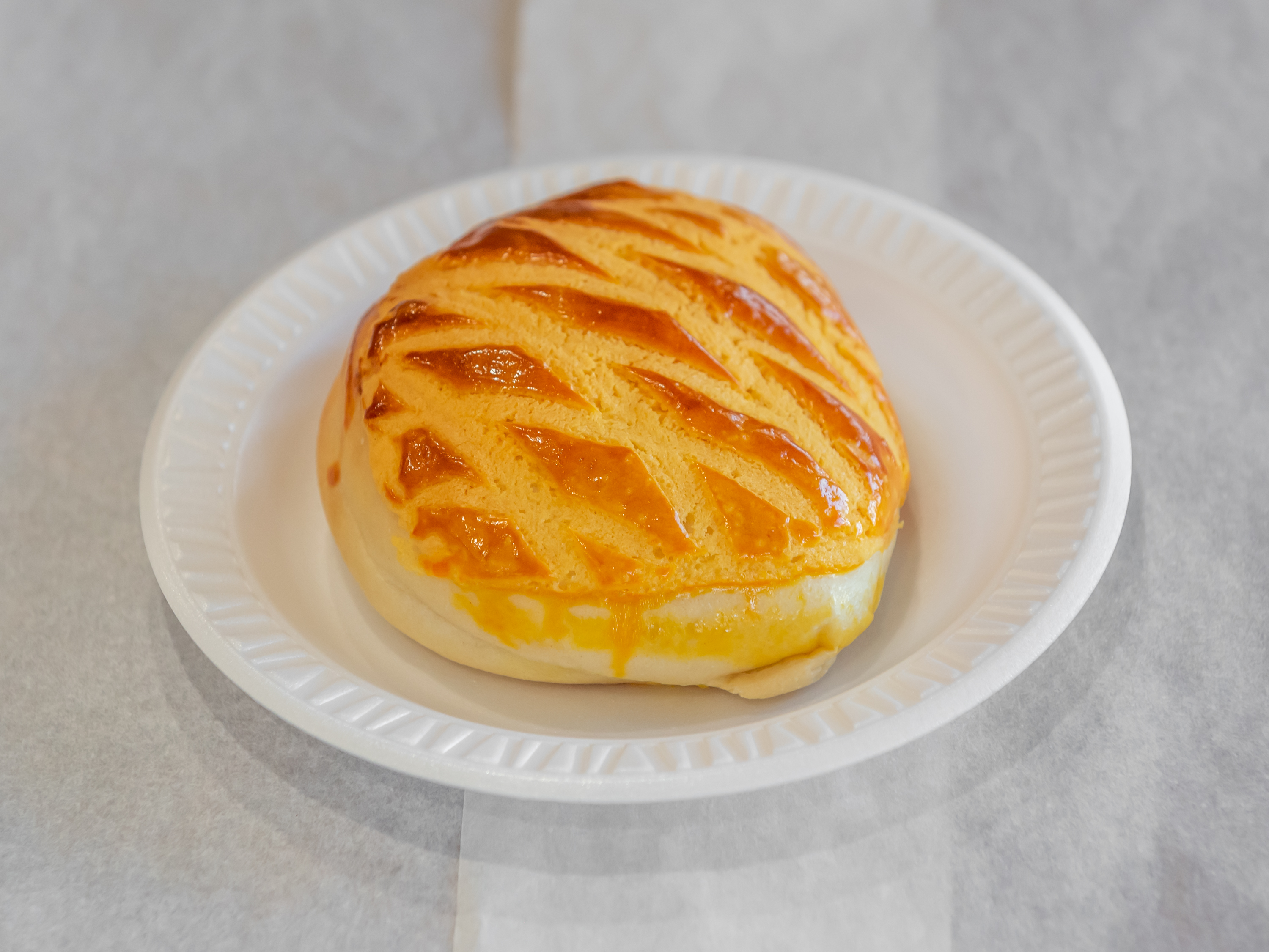 Order Baked Custard Bun (焗加映包) food online from Long Family Pastry store, Los Angeles on bringmethat.com