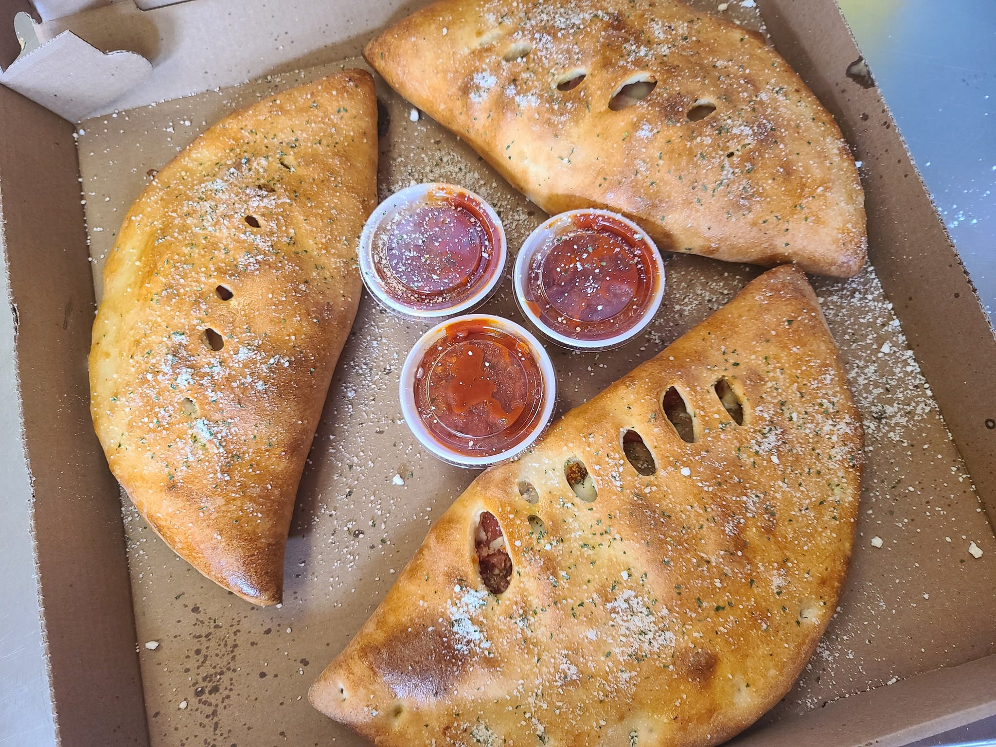 Order Meat Lover's Calzone - Personal food online from  Giuseppe's Pizza Shop store, Keeseville on bringmethat.com