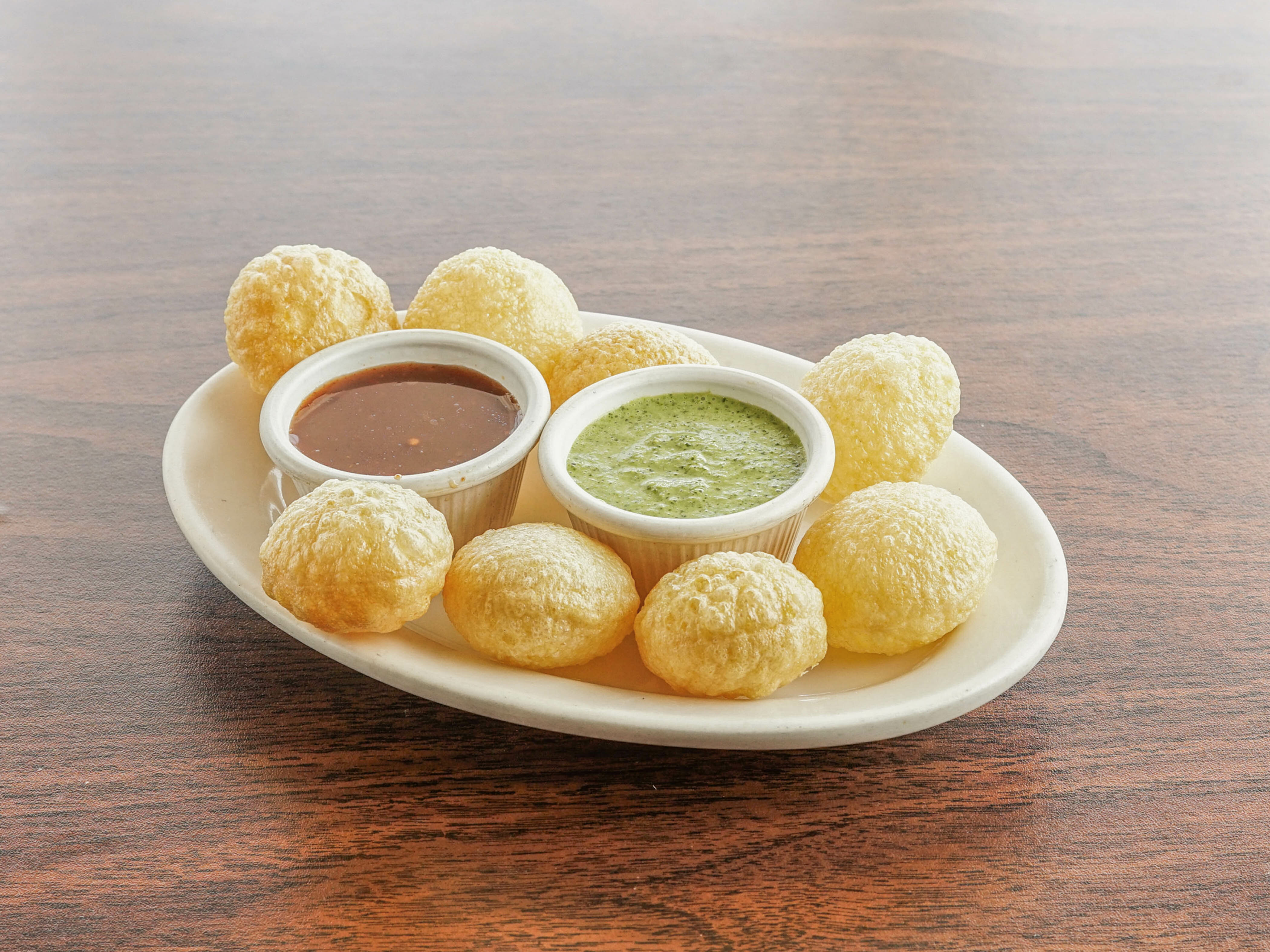 Order Pani Poori food online from Kitchen of India store, Parkville on bringmethat.com