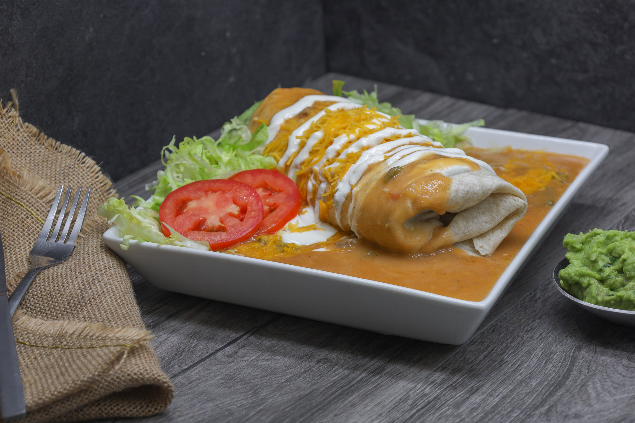 Order Smothered Burritos  food online from Taco River store, Commerce City on bringmethat.com