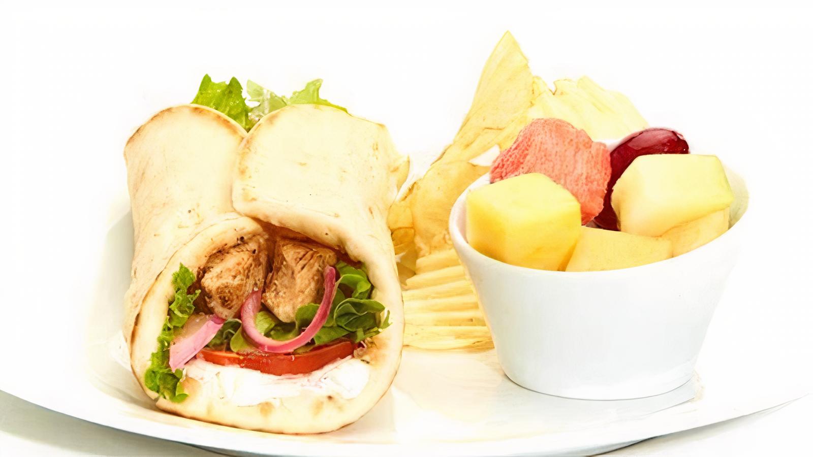 Order Grilled Chicken Gyro food online from Taziki's Mediterranean Cafe store, Brentwood on bringmethat.com