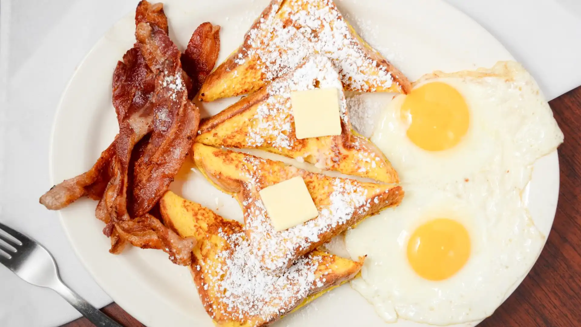 Order French Toast and 2 Eggs food online from Crazy Otto Diner store, Valencia on bringmethat.com