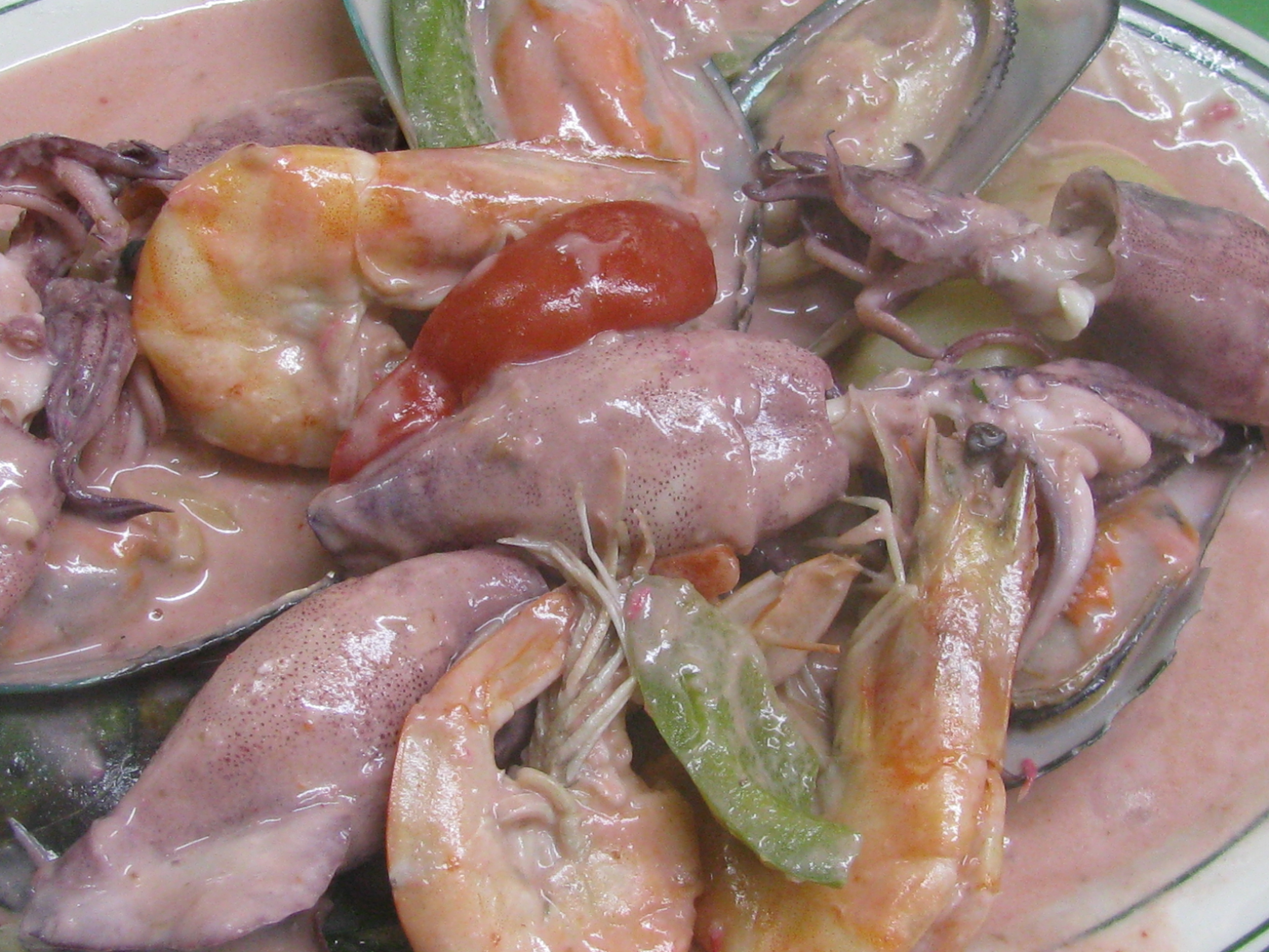 Order Mixed Seafood in coconut milk food online from Maynila On Main Street store, Carson on bringmethat.com