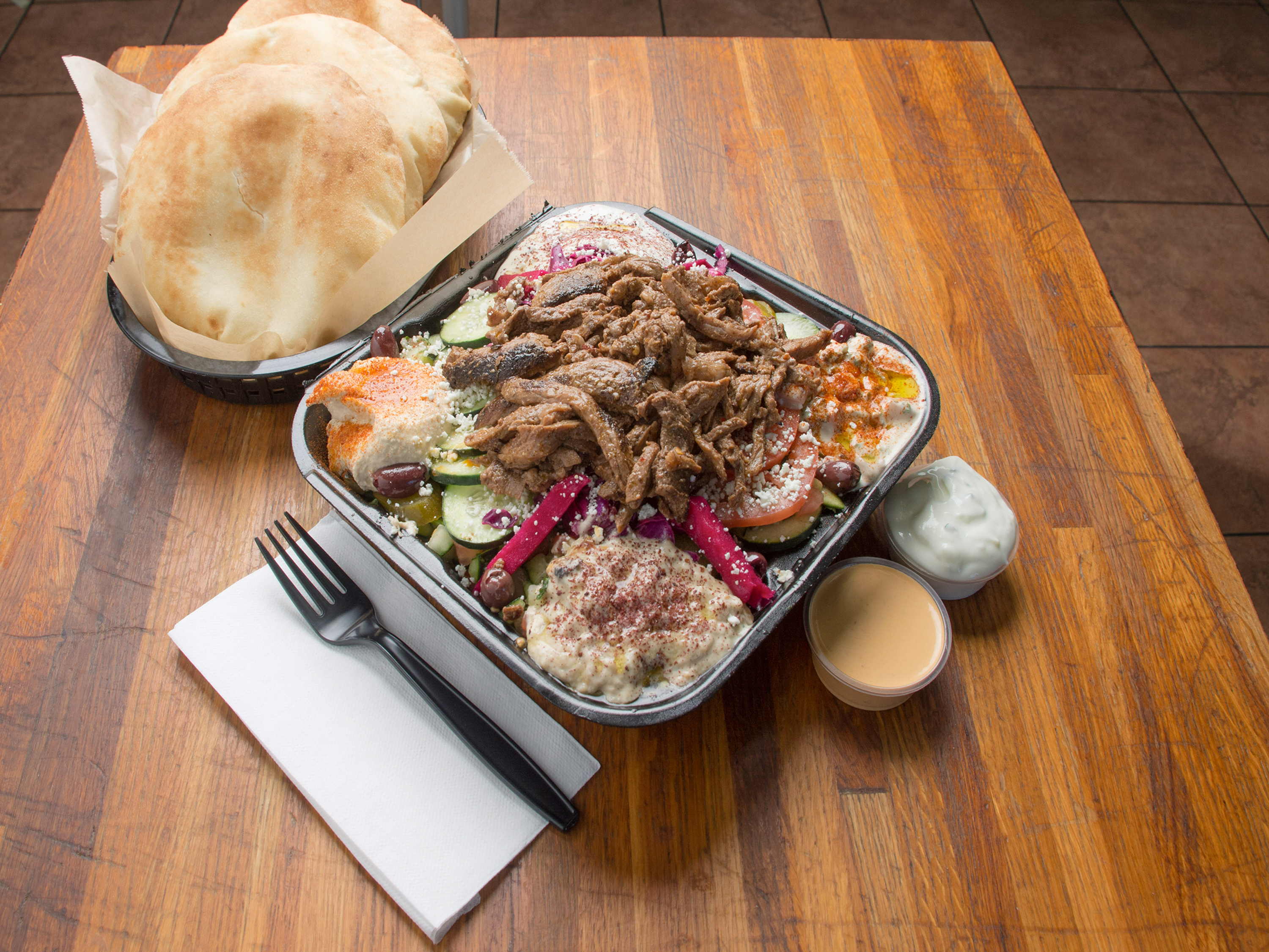 Order Beef Tri-Tip and Lamb Salad food online from Pita Guys store, San Marcos on bringmethat.com