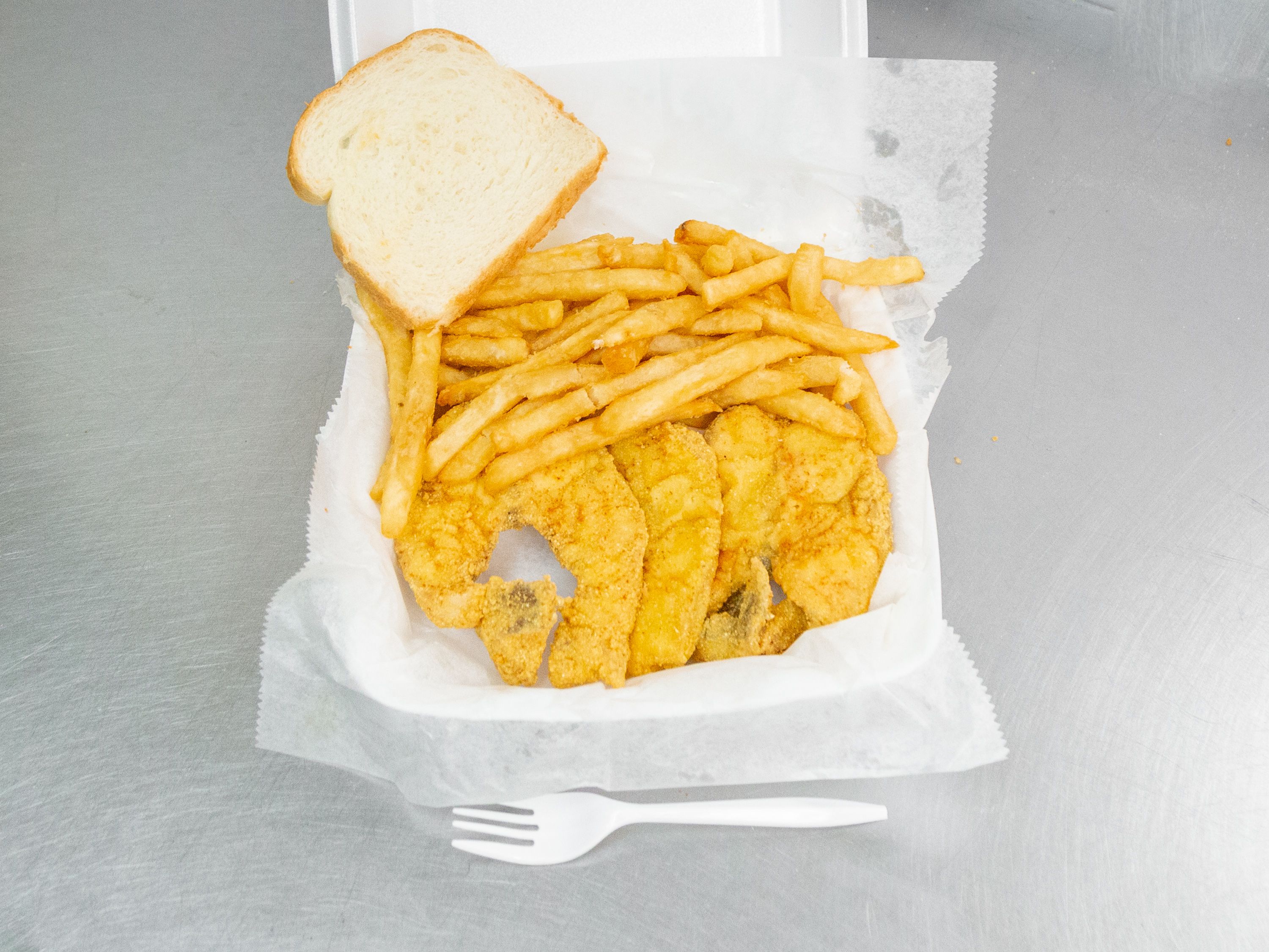 Order 12 Pieces Catfish food online from Jj Fish & Chicken store, Chicago on bringmethat.com