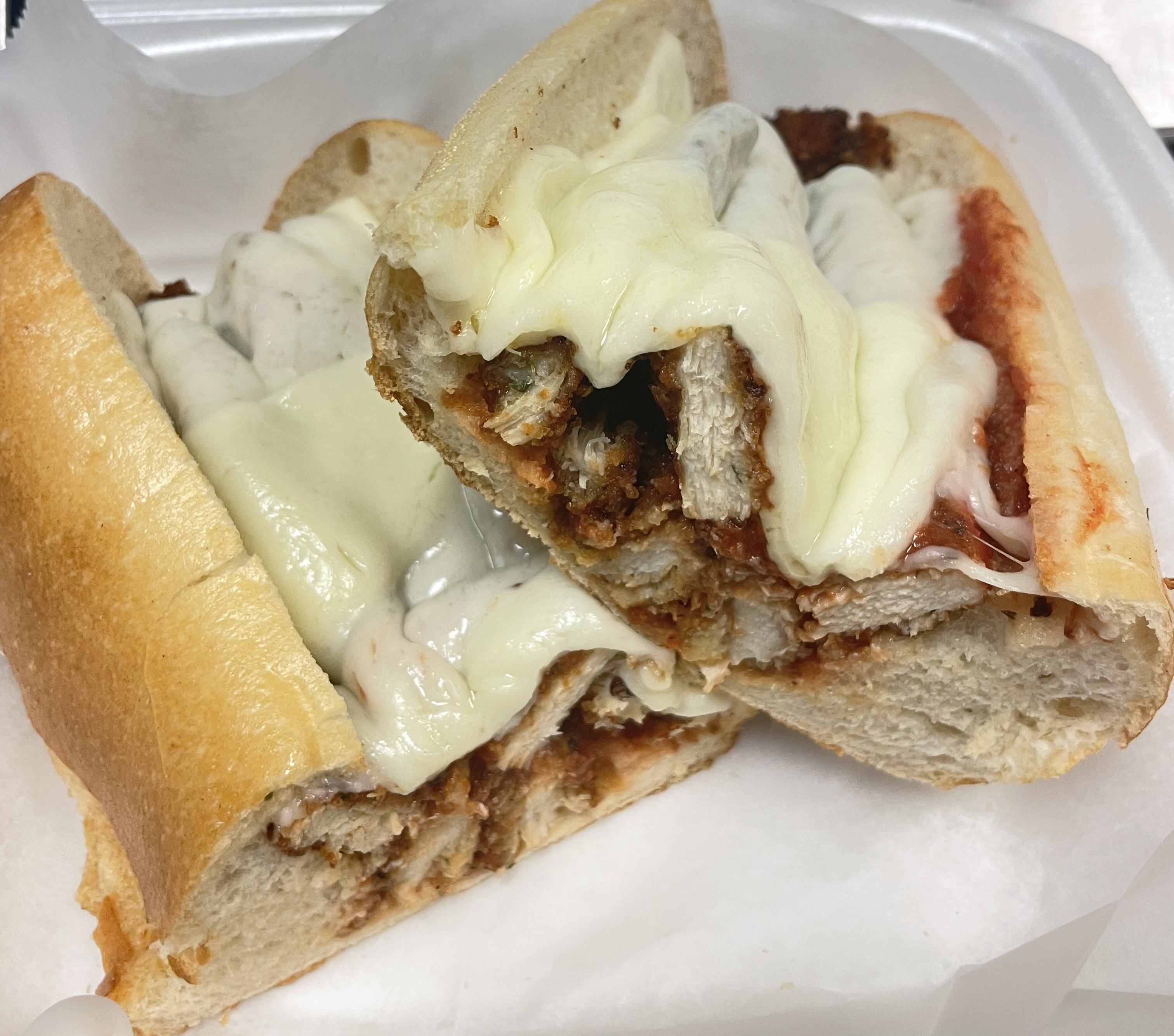 Order Chicken Parmigiana Sandwich food online from Dolce carini pizza store, Philadelphia on bringmethat.com