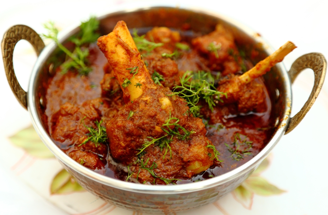 Order Lamb Curry food online from India Oven store, Roseville on bringmethat.com