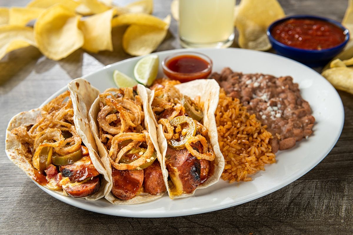 Order Mesquite Smoked Jalapeño Sausage Tacos food online from On The Border store, Little Rock on bringmethat.com