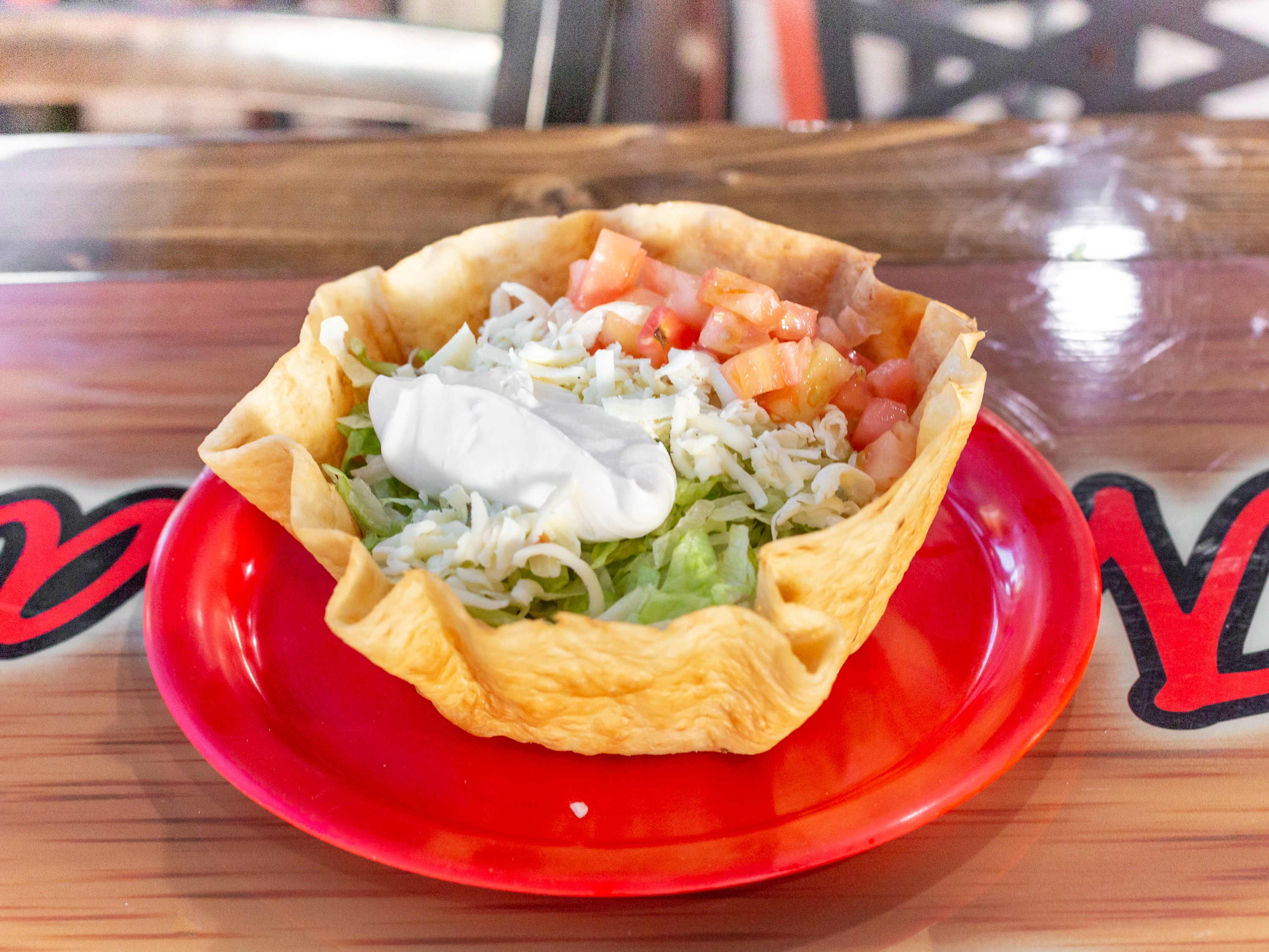 Order Taco Salad food online from Los Amigos store, Kalamazoo on bringmethat.com