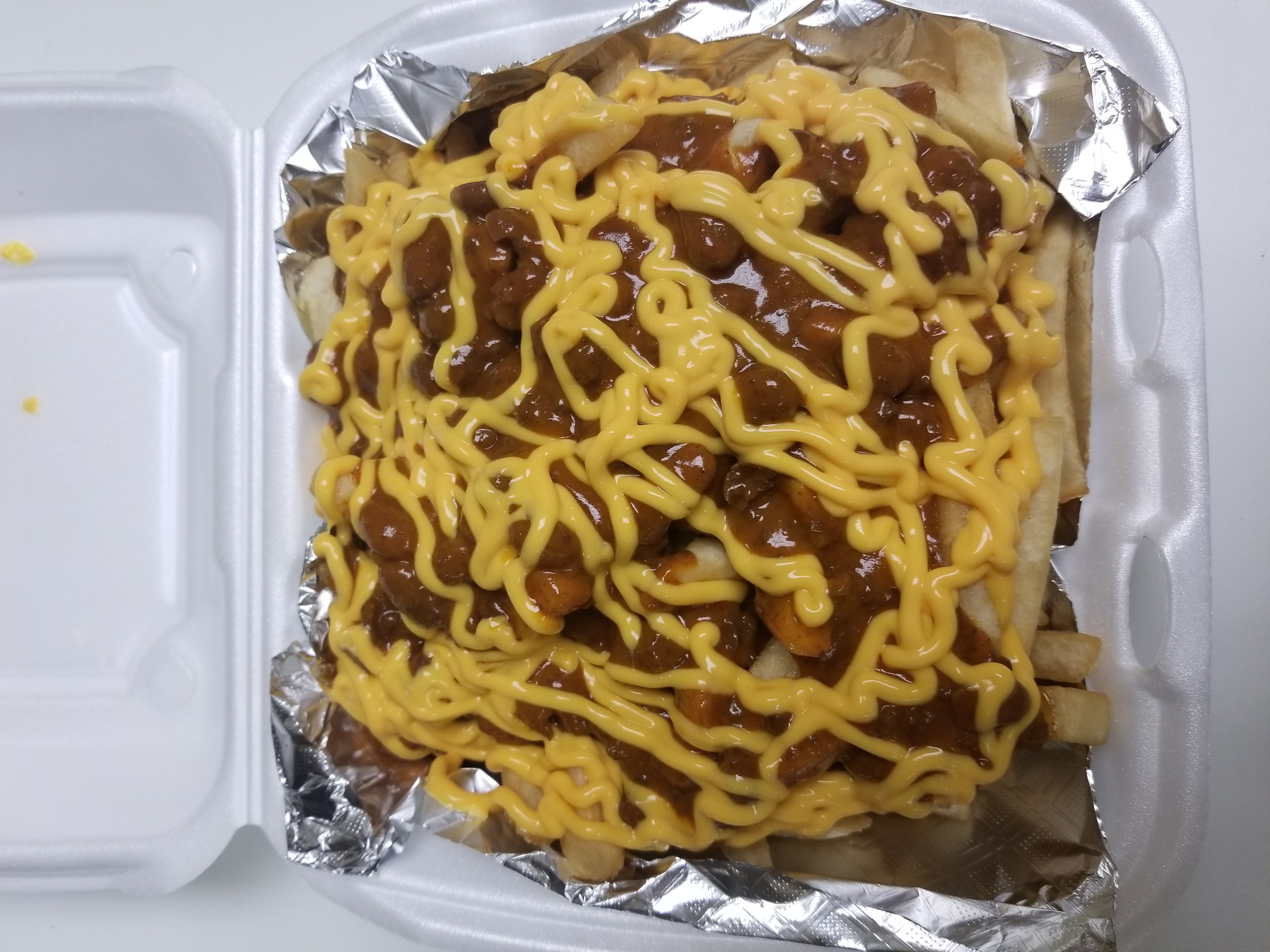 Order Chili Cheese Fries food online from H & A Deli store, Rochester on bringmethat.com