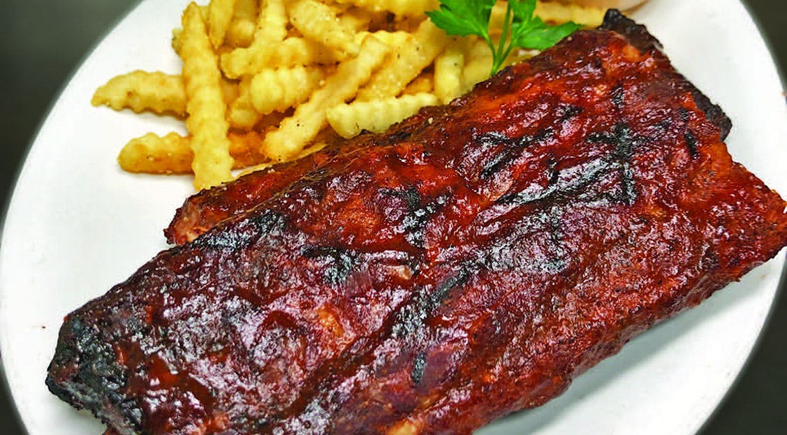 Order BBQ Baby Back Ribs - Half Slab food online from Chasers Sports Bar & Grill store, Niles on bringmethat.com