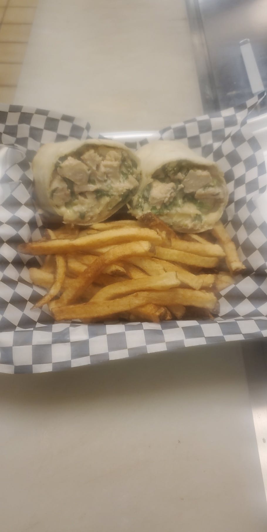 Order Chicken Caesar Wrap - Wrap food online from Pizza Leone store, Fairfield on bringmethat.com