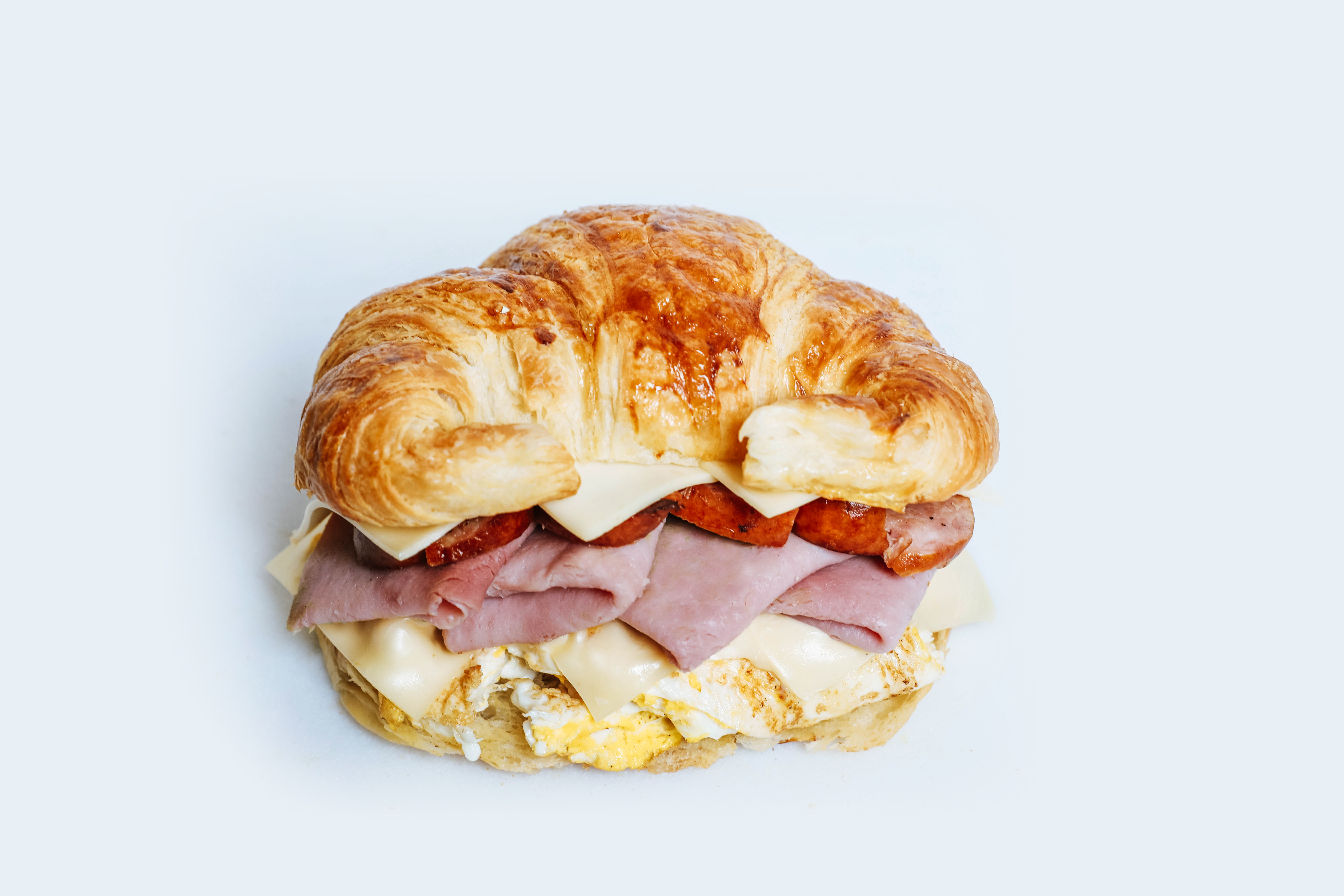 Order #14 Croissant Sandwich food online from Dc Donut Cafe store, Granada Hills on bringmethat.com