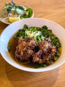 Order Pho Oxtail food online from Soup Shop store, Gardena on bringmethat.com