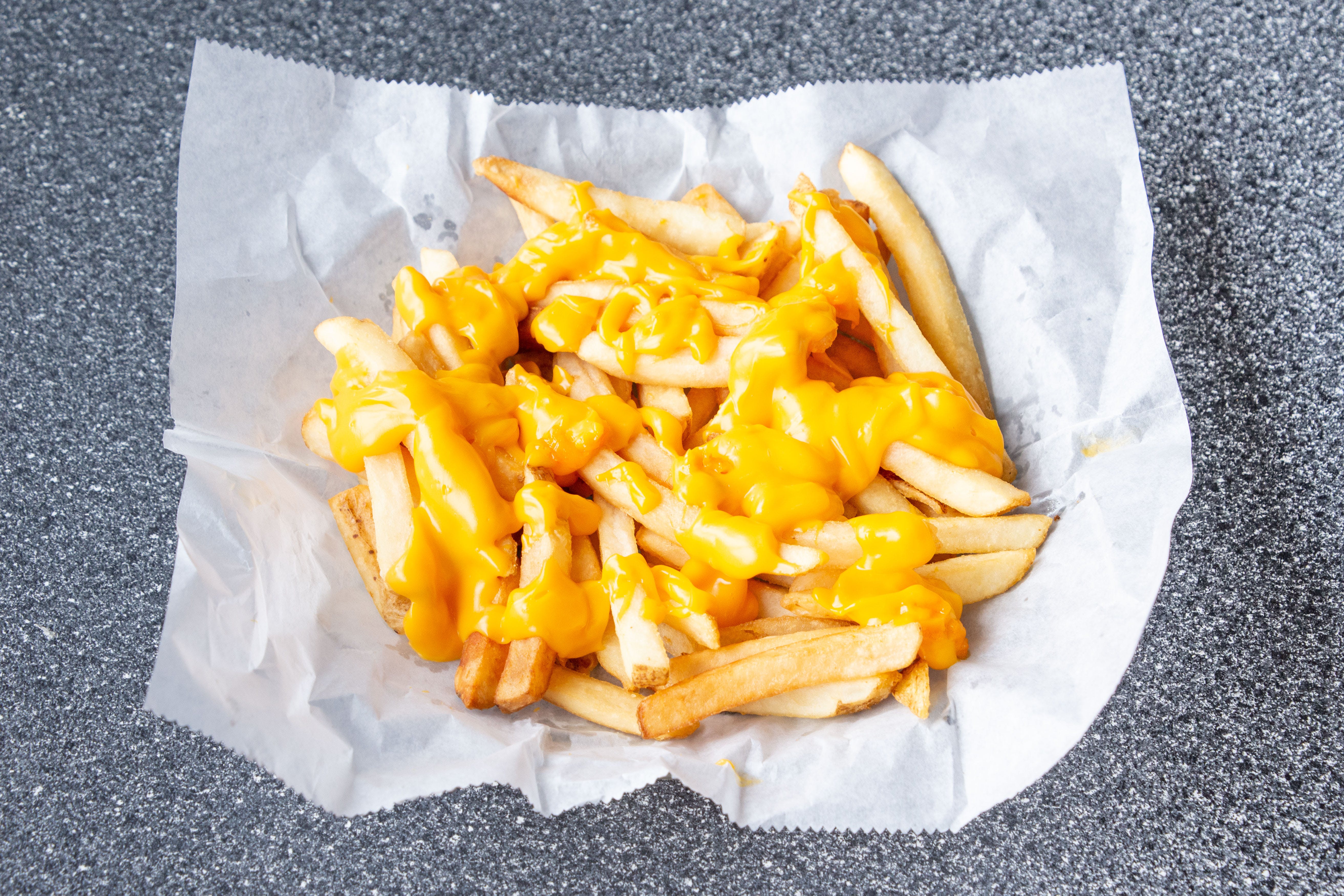 Order Cheddar Cheese Fries - Medium food online from Pizza City store, Woodbury Heights on bringmethat.com