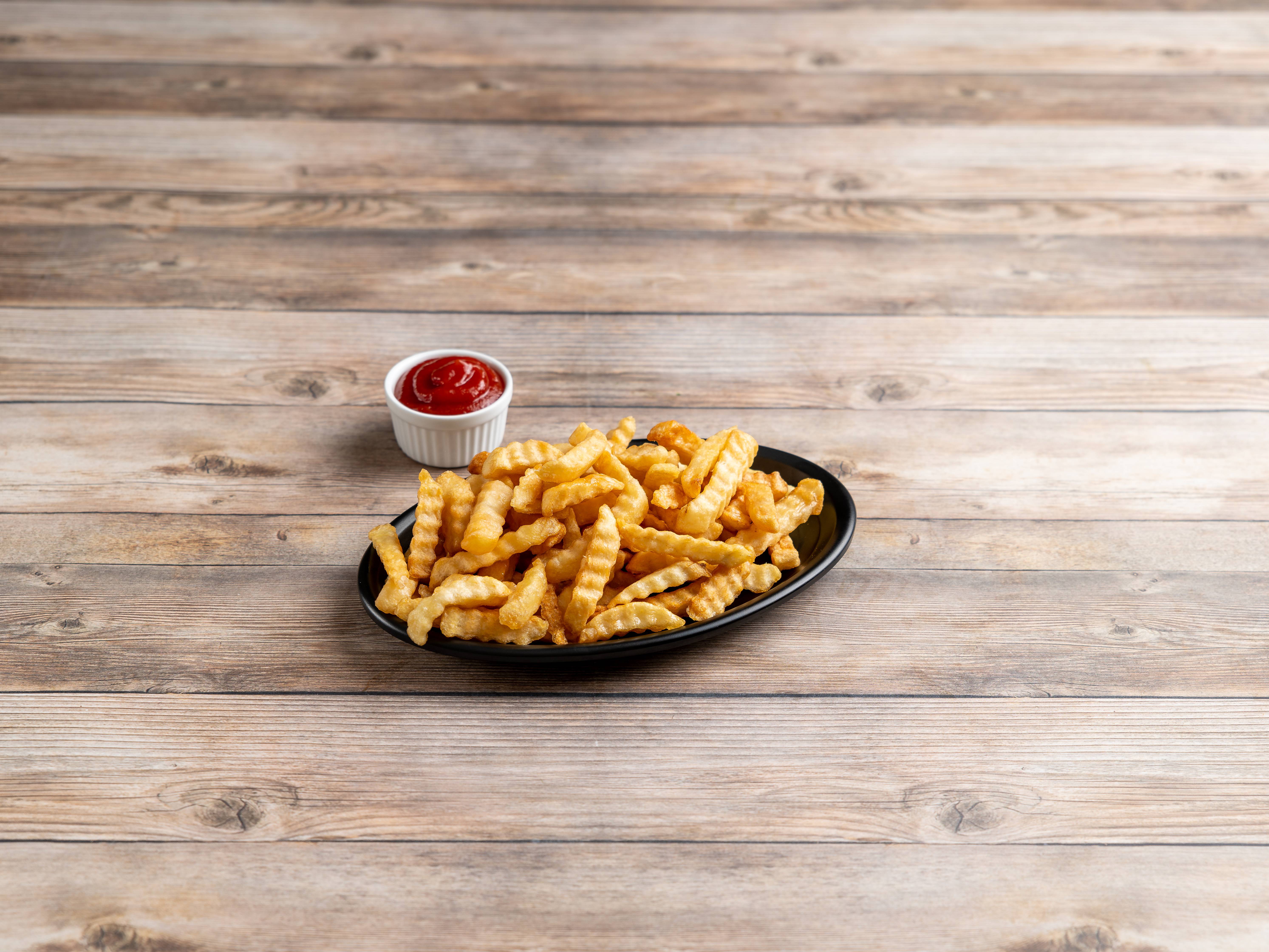 Order French Fries food online from Rick Cheesesteak Shop store, Newport News on bringmethat.com