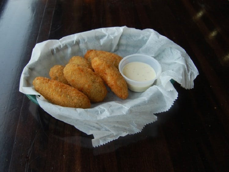 Order Jalapeno Poppers - 6 Pieces food online from Claymont Steak Shop store, Claymont on bringmethat.com