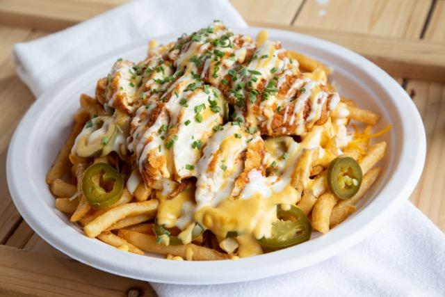 Order QUESO FRIES food online from Chick-In Waffle store, Kansas City on bringmethat.com
