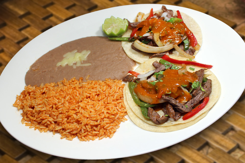 Order 2 Baja Tacos Beef Fajita Style food online from Taqueria San Miguel store, Cathedral City on bringmethat.com
