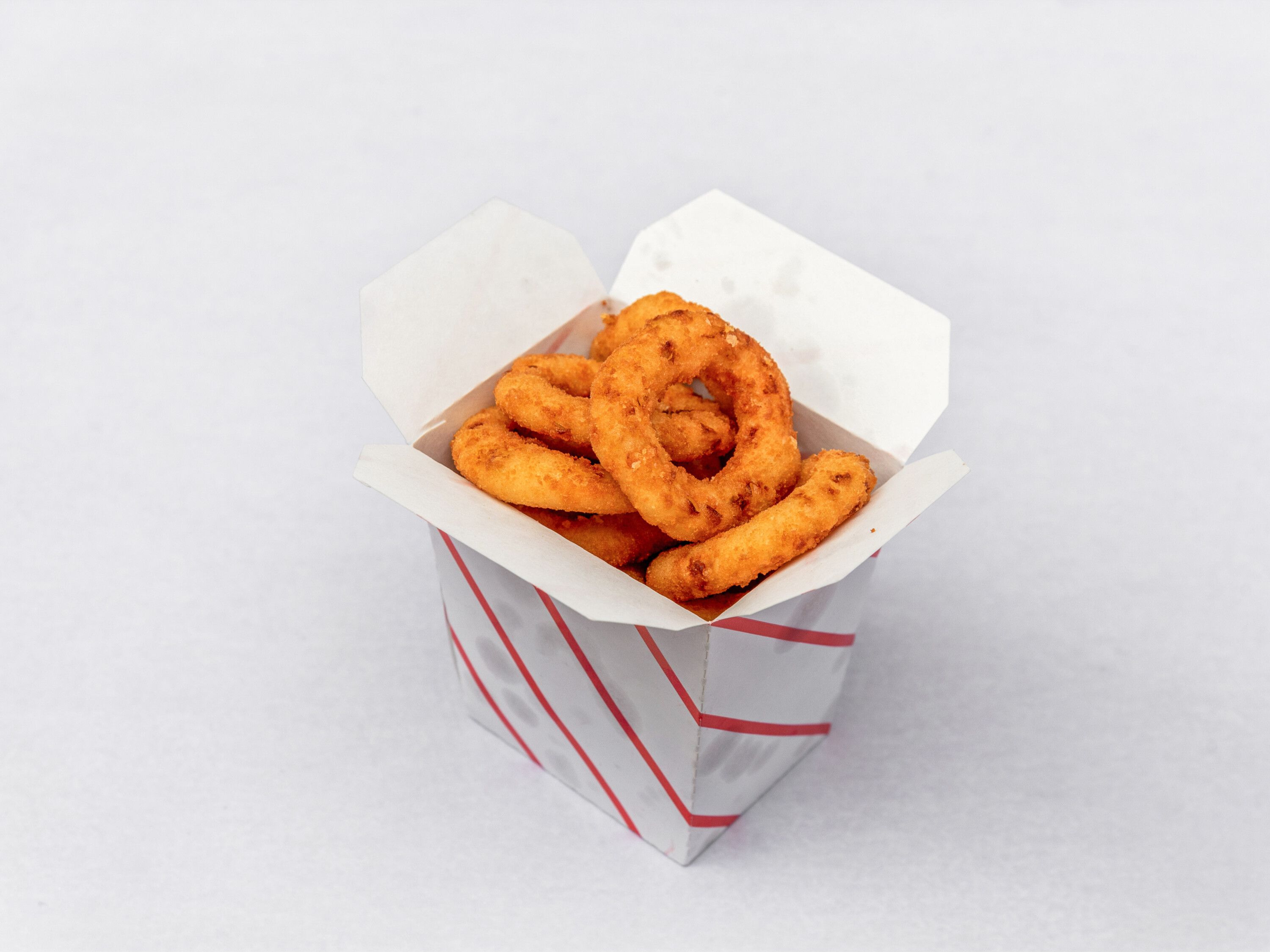 Order Onion Rings food online from Arboretum Pizza Grill store, Roslindale on bringmethat.com