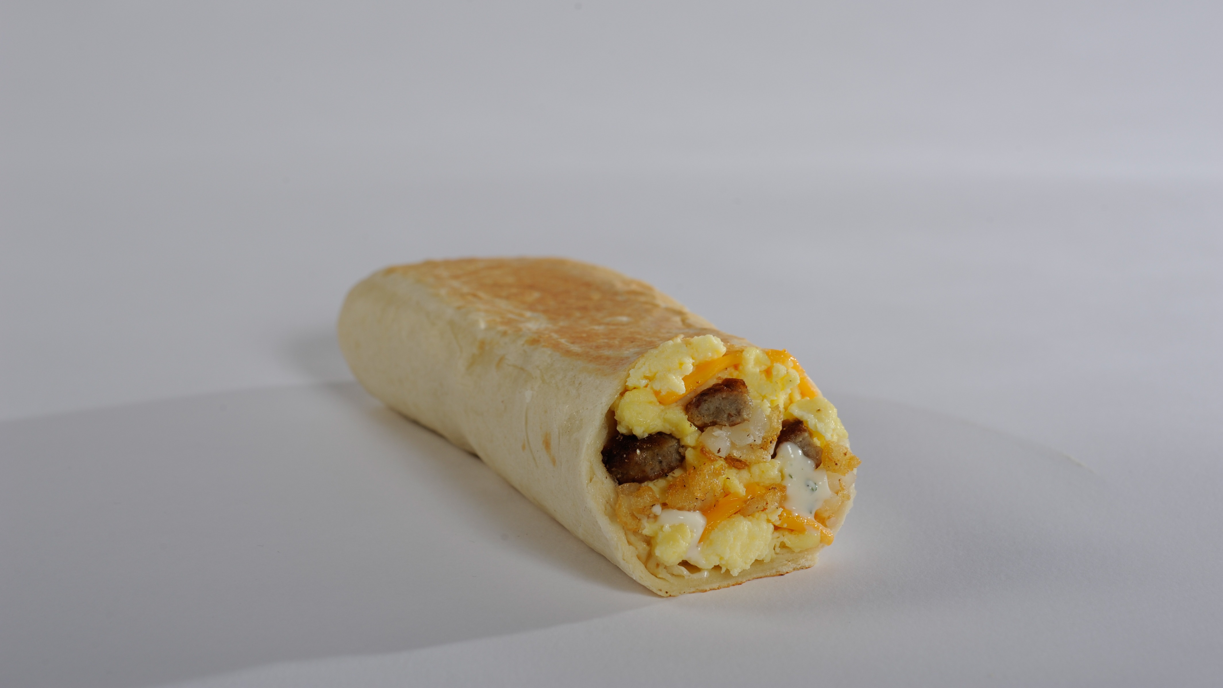 Order Grande Breakfast Burrito Combo Meal food online from Amigos/Kings Classic store, Lincoln on bringmethat.com