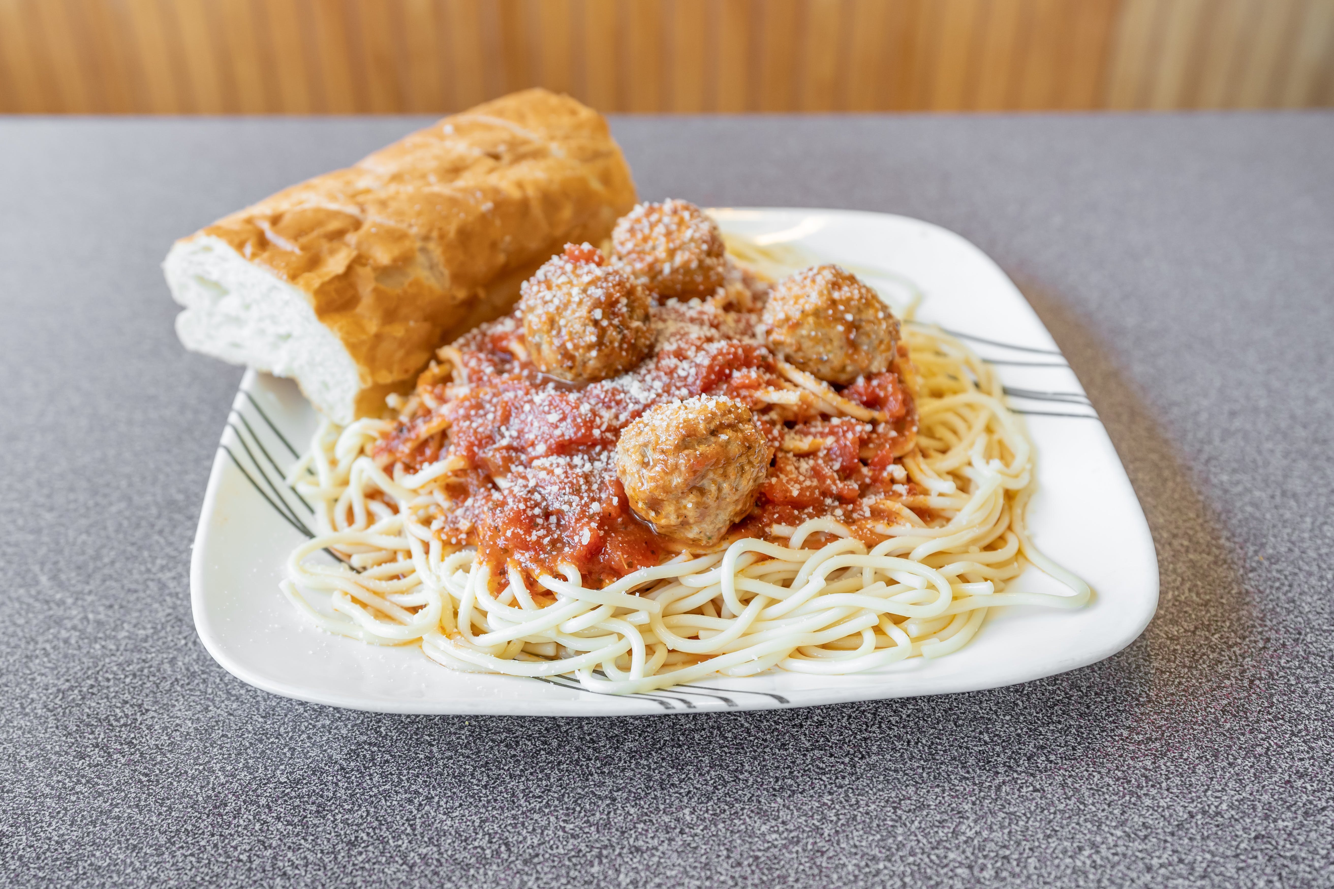 Order Spaghetti with Meatballs - Pasta food online from Arlington House of Pizza store, Arlington on bringmethat.com