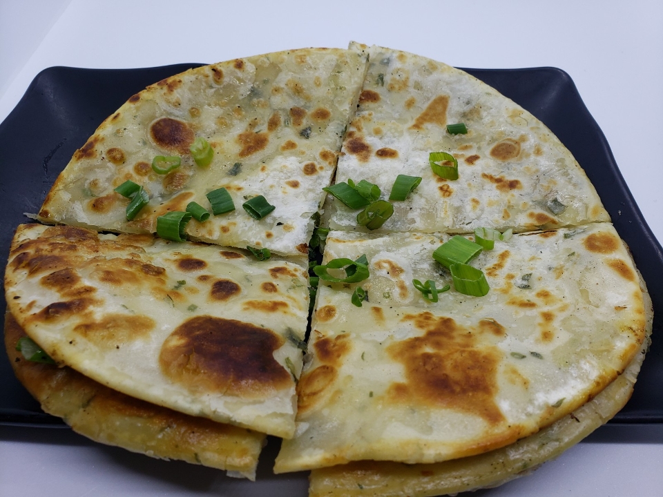 Order Scallion Pancake (8) food online from Chi dynasty store, Los Angeles on bringmethat.com