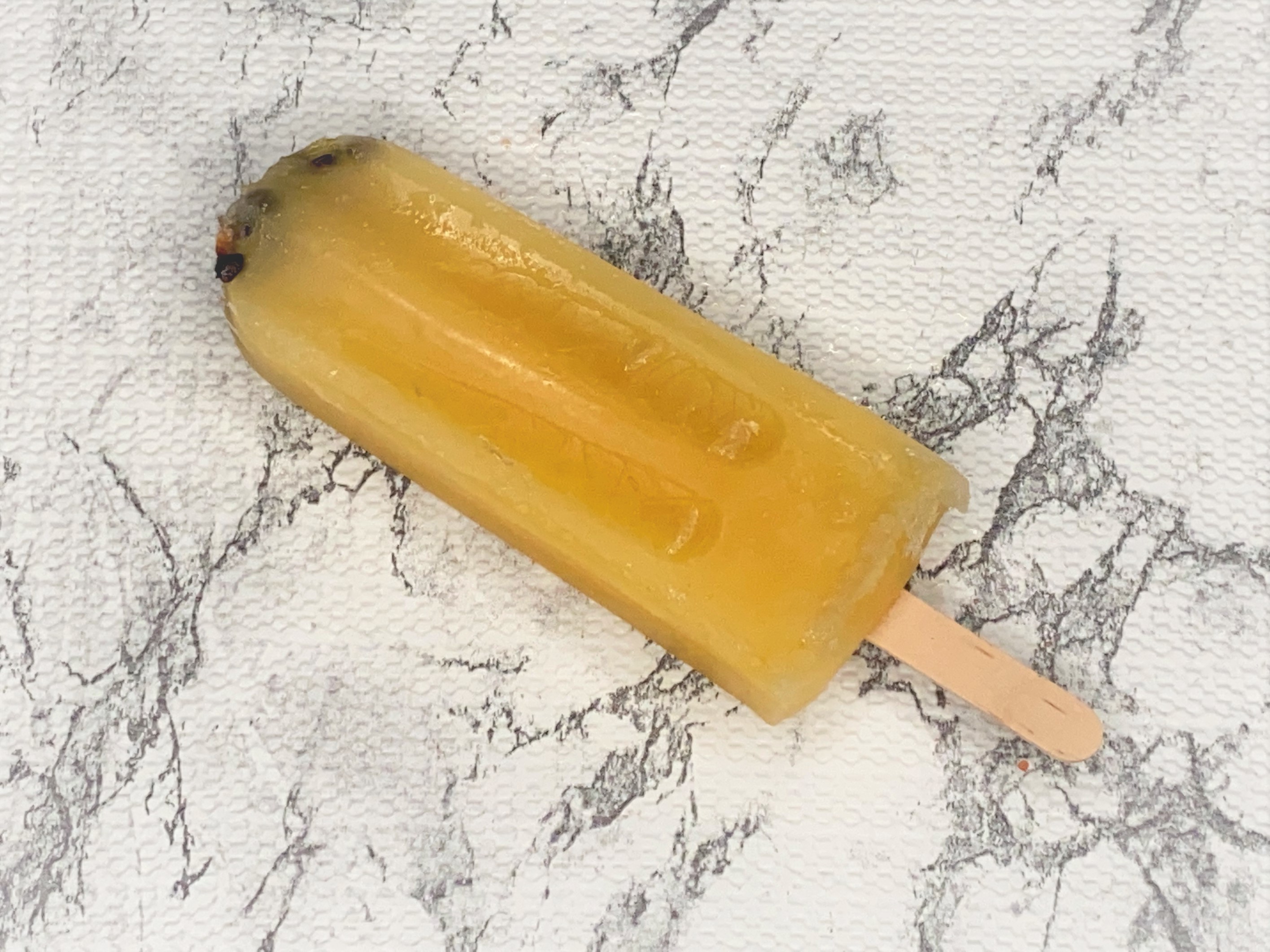 Order Passion Fruit Paletas food online from Ome Calli store, Beaverton on bringmethat.com