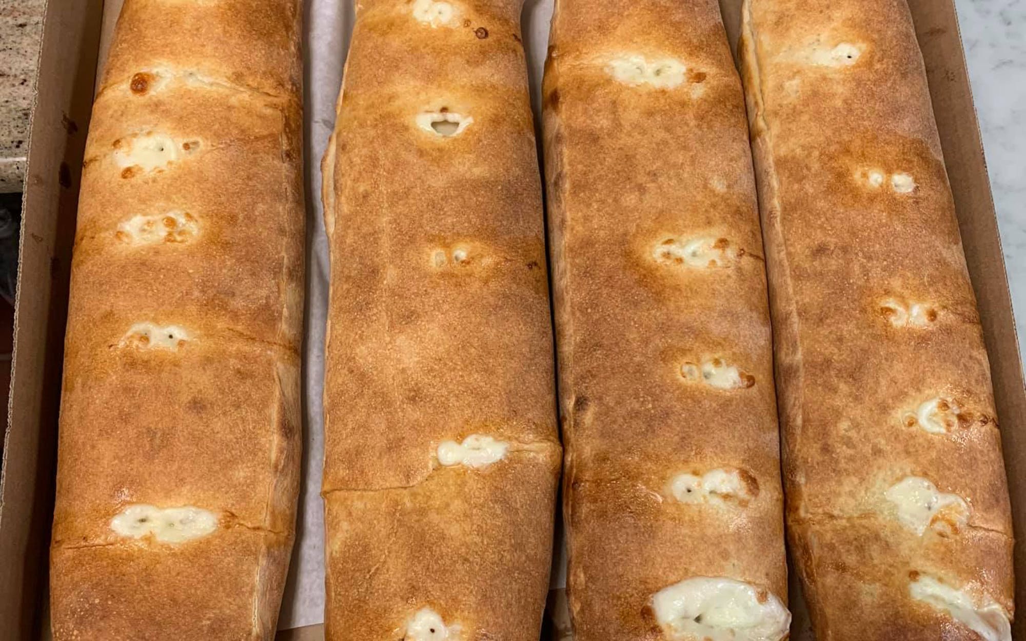Order Large Stromboli food online from Frankie's Pizza & Restaurant store, Berkeley Township on bringmethat.com