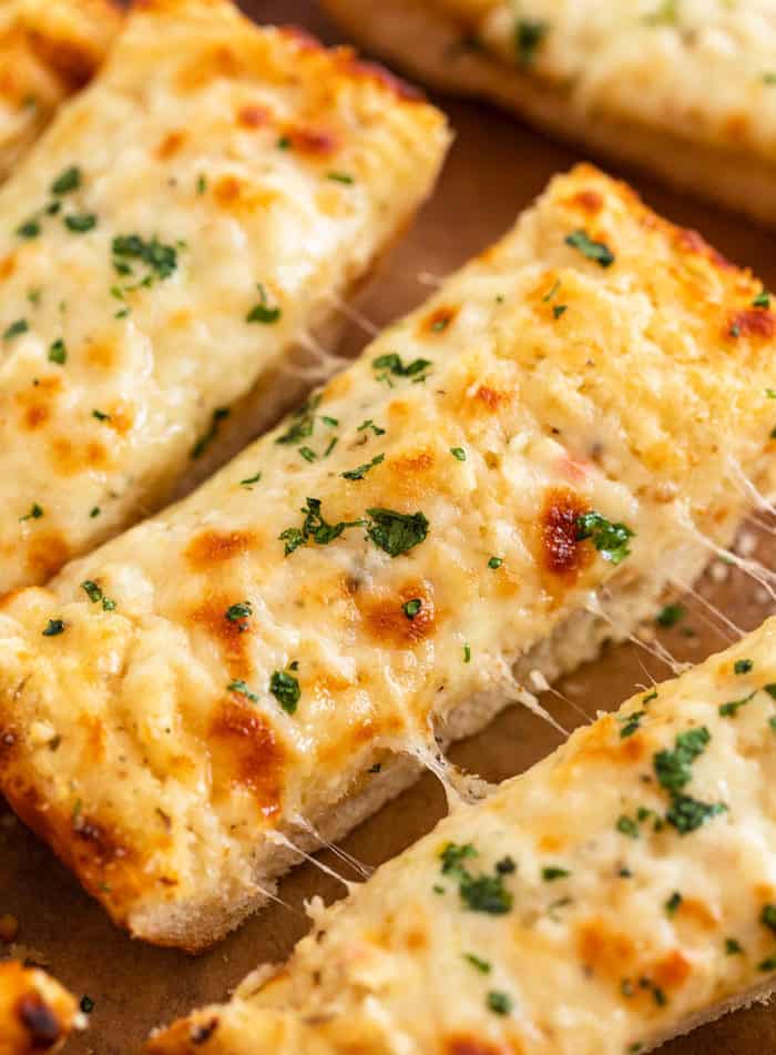 Order Side of Garlic Cheese Bread Square food online from Pizza Azteca store, Dallas on bringmethat.com
