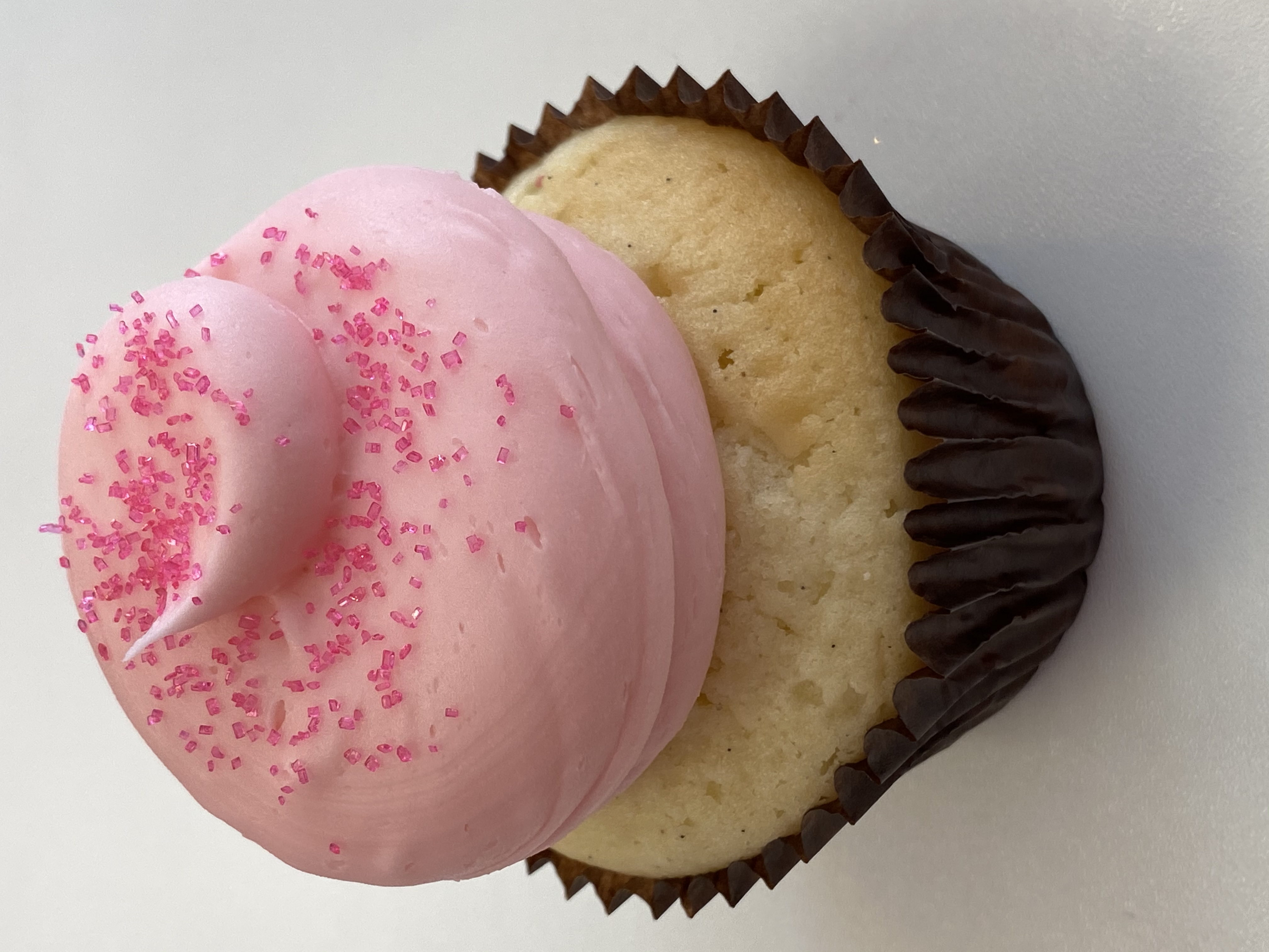 Order Pink Vanilla Cupcake food online from Smallcakes store, Richmond on bringmethat.com