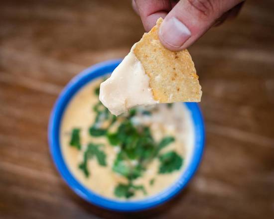 Order Our Famous Queso and Chips food online from Taco Ocho store, Flower Mound on bringmethat.com