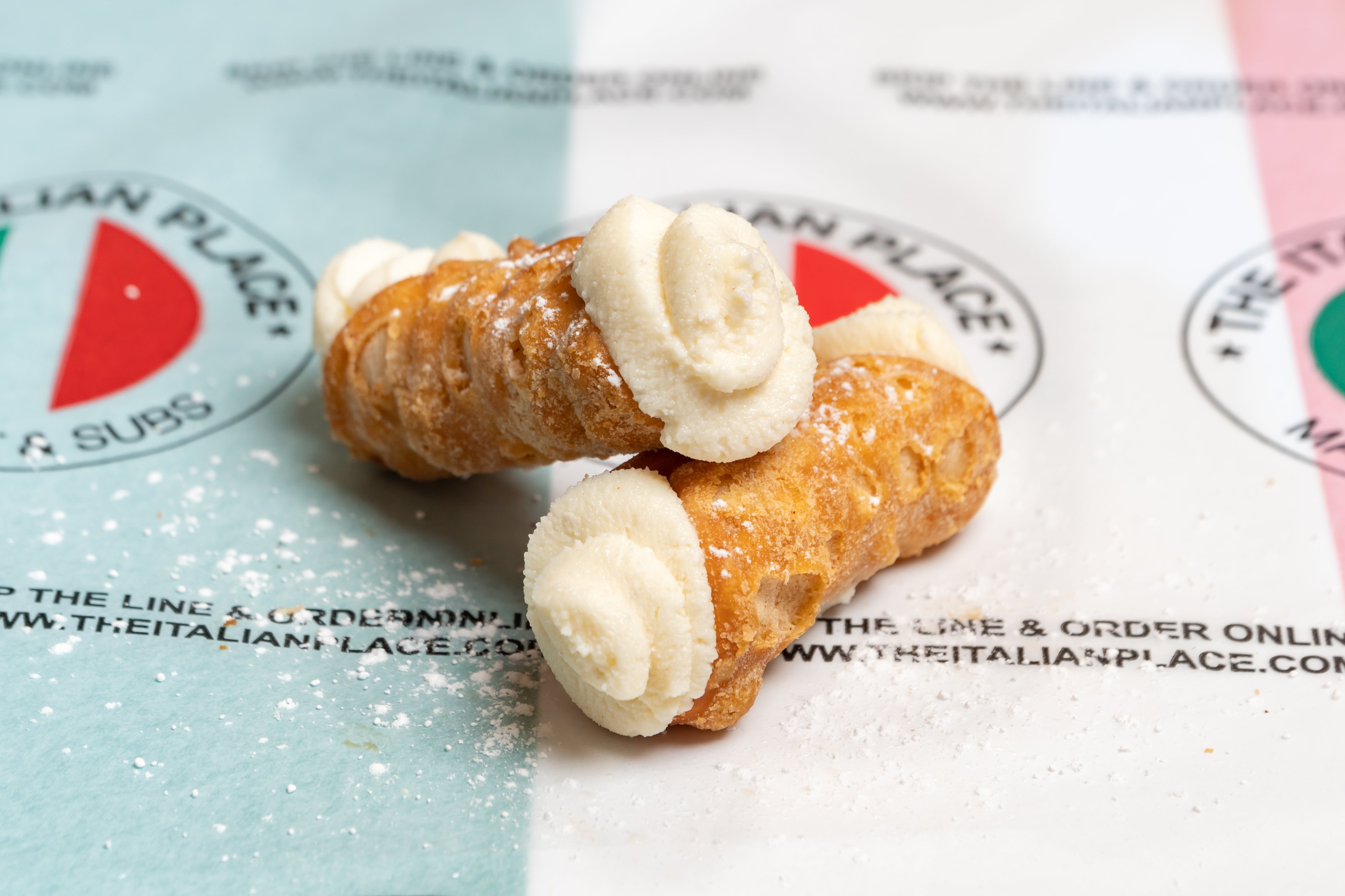 Order Mini Cannolis - 2 Pieces food online from The Italian Place store, Fairfax on bringmethat.com