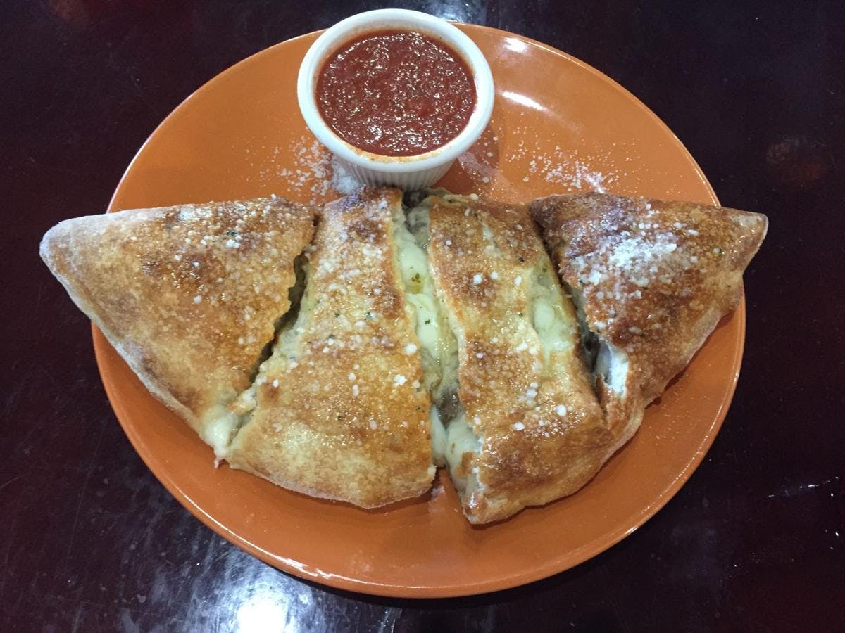 Order Cheese Calzone - Small food online from Primo Italian Cuisine & Catering store, Unicoi on bringmethat.com