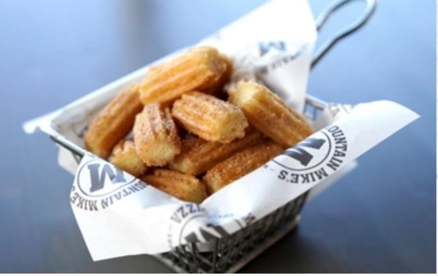 Order Churros - Mini (16 Pieces) food online from Mountain Mike's Pizza store, Sacramento on bringmethat.com