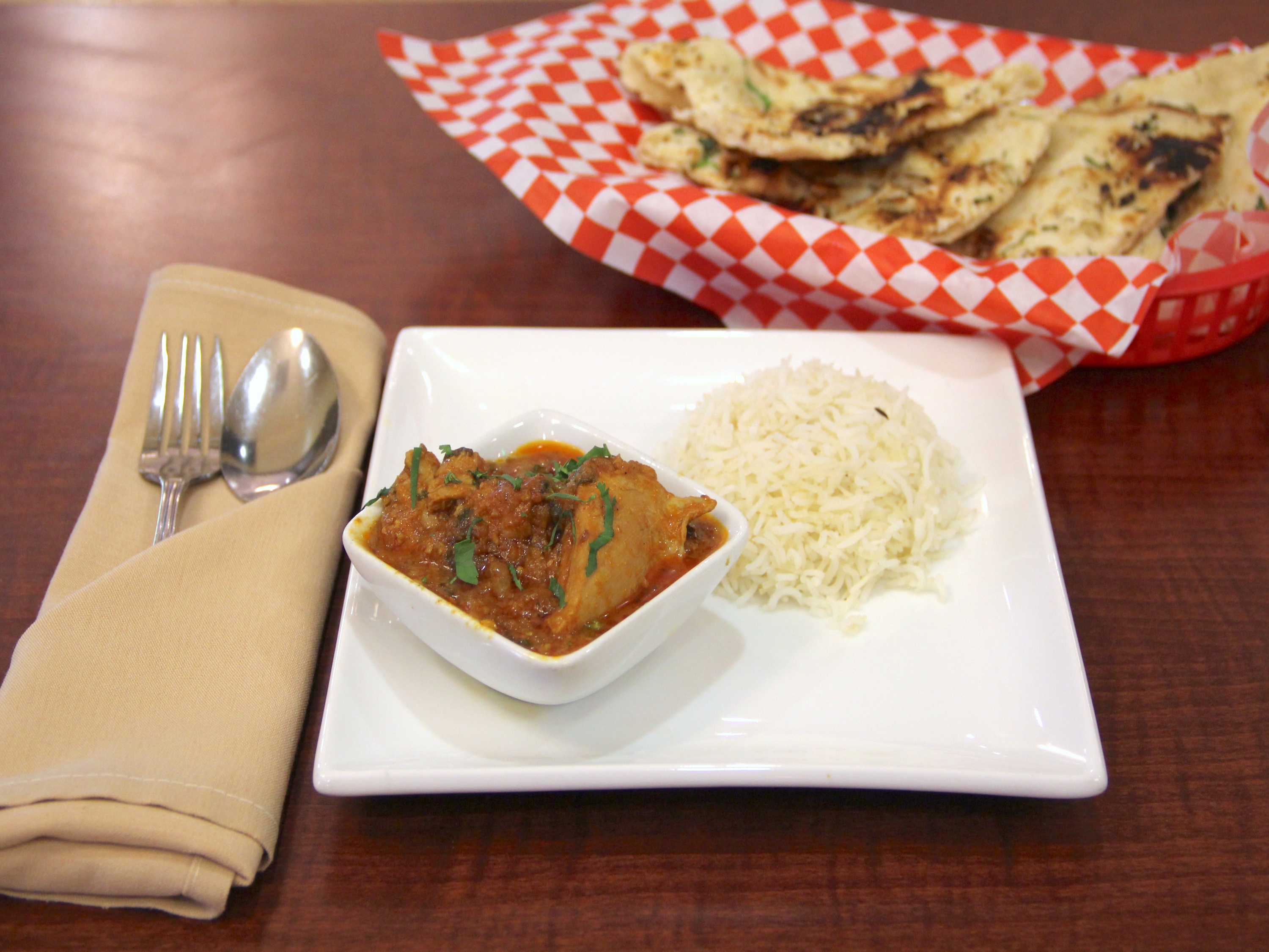 Order Chicken Curry food online from Bombay Blues Indian Restaurant store, Chino Hills on bringmethat.com