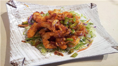Order 9. Cajun Calamari Tempura food online from Yomama Sushi store, Camarillo on bringmethat.com