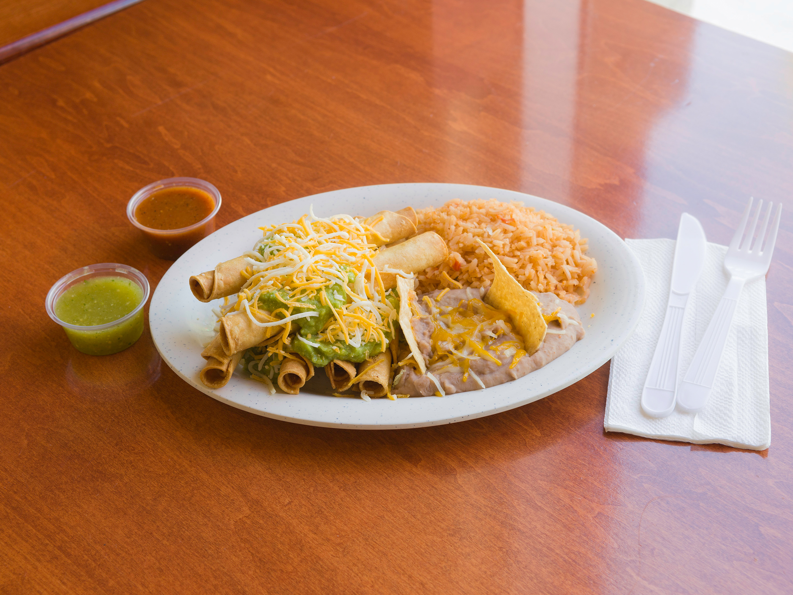 Order 3 Rolled Tacos food online from Tosinos Mexican Grill store, Gilbert on bringmethat.com