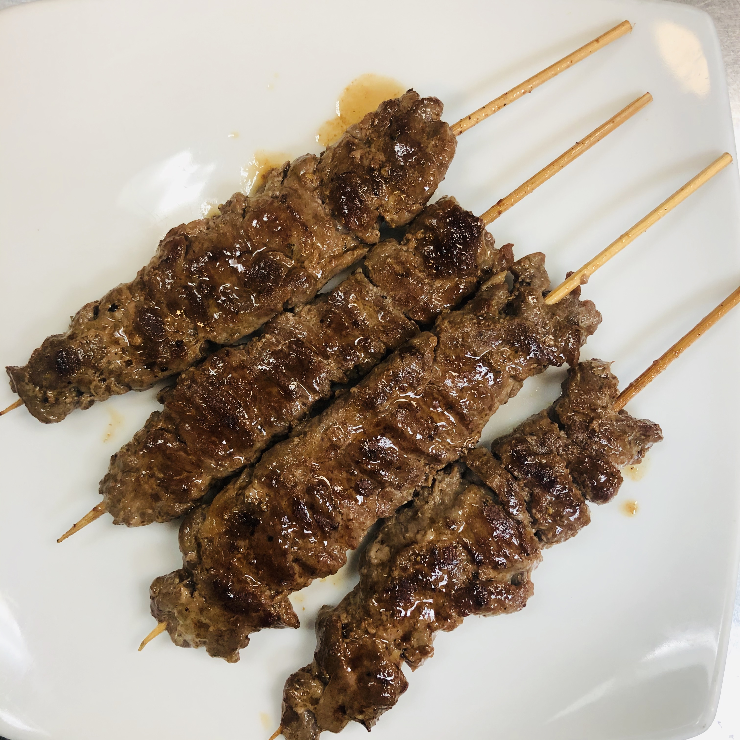 Order A14. Beef Skewers food online from Bangkok Orchid Thai Restaurant store, Irving on bringmethat.com